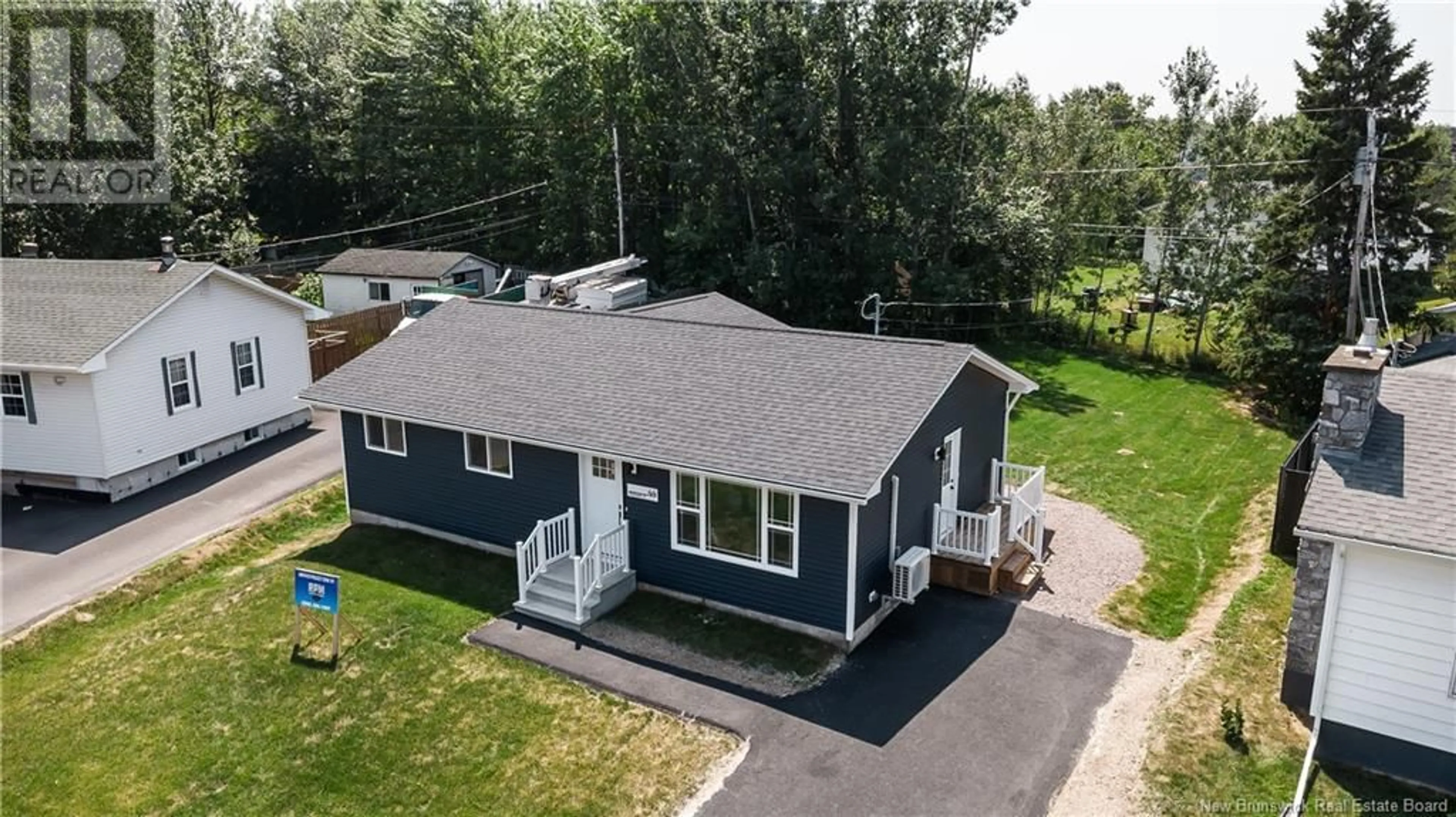 A pic from outside/outdoor area/front of a property/back of a property/a pic from drone, street for 44 TEESDALE, Moncton New Brunswick E1A5K5
