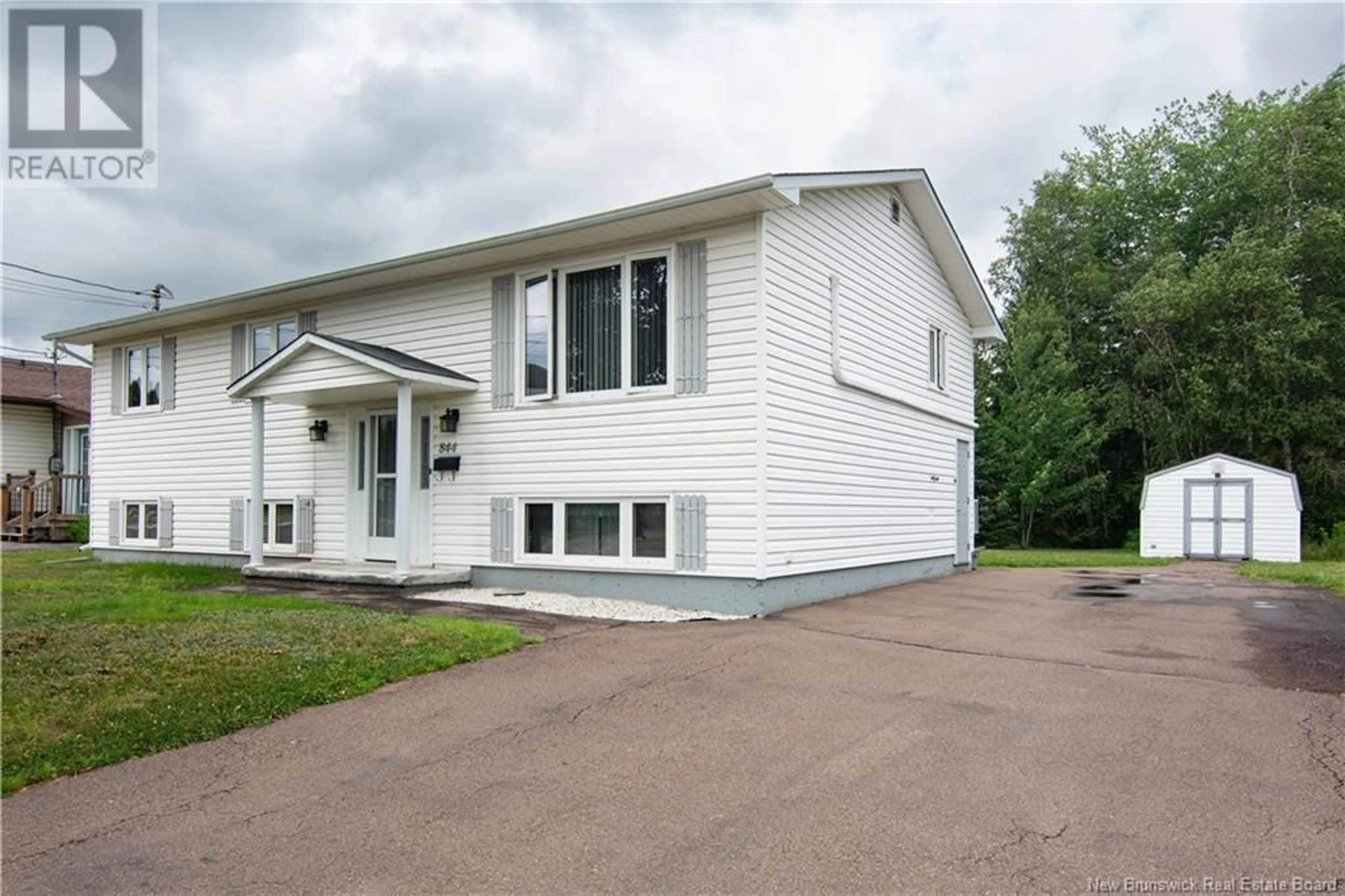 Home with vinyl exterior material, street for 844 CENTRALE, Dieppe New Brunswick E1A6M8