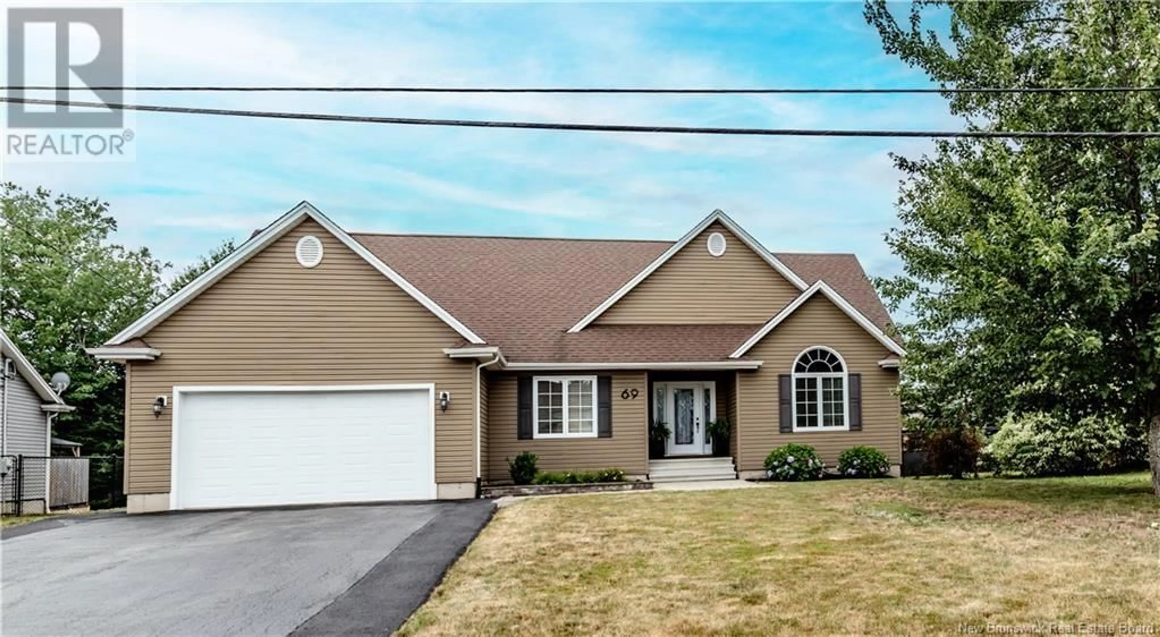 Home with vinyl exterior material, street for 69 RICHARD, Dieppe New Brunswick E1A0J9