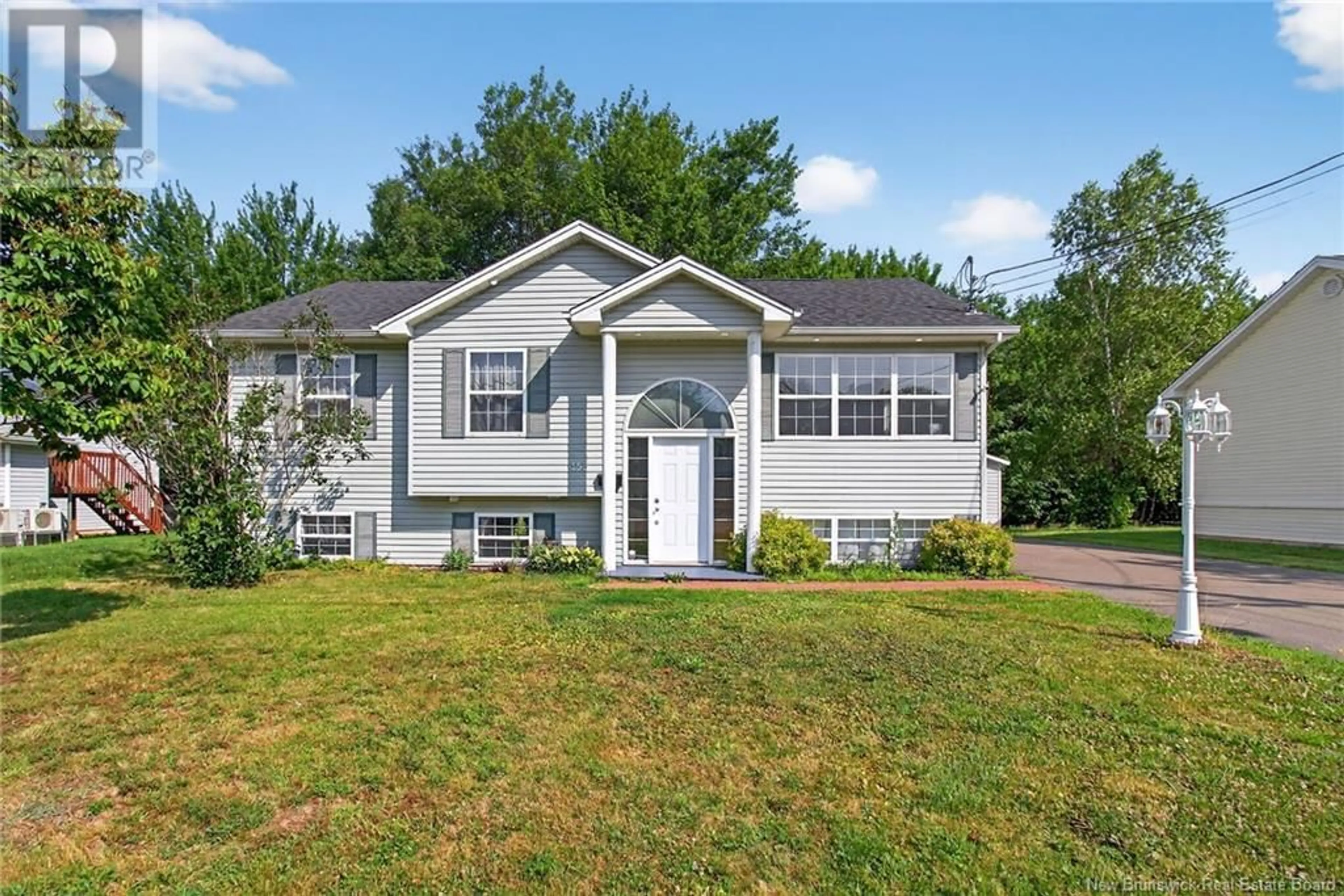 Home with vinyl exterior material, street for 153 BAHAMA STREET, Dieppe New Brunswick E1A6M9