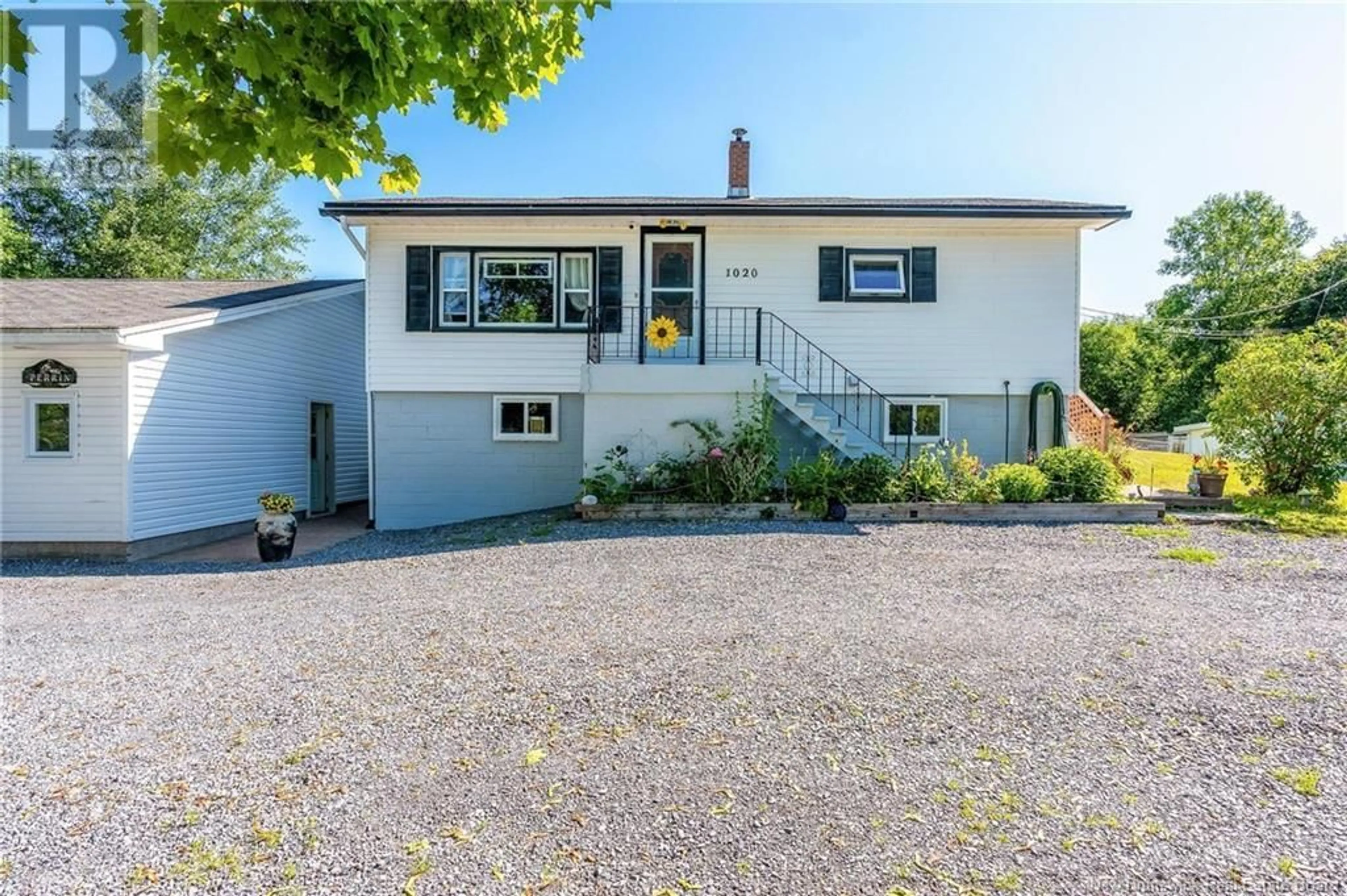 Home with vinyl exterior material, street for 1020 WESTFIELD ROAD, Saint John New Brunswick E2M7N2