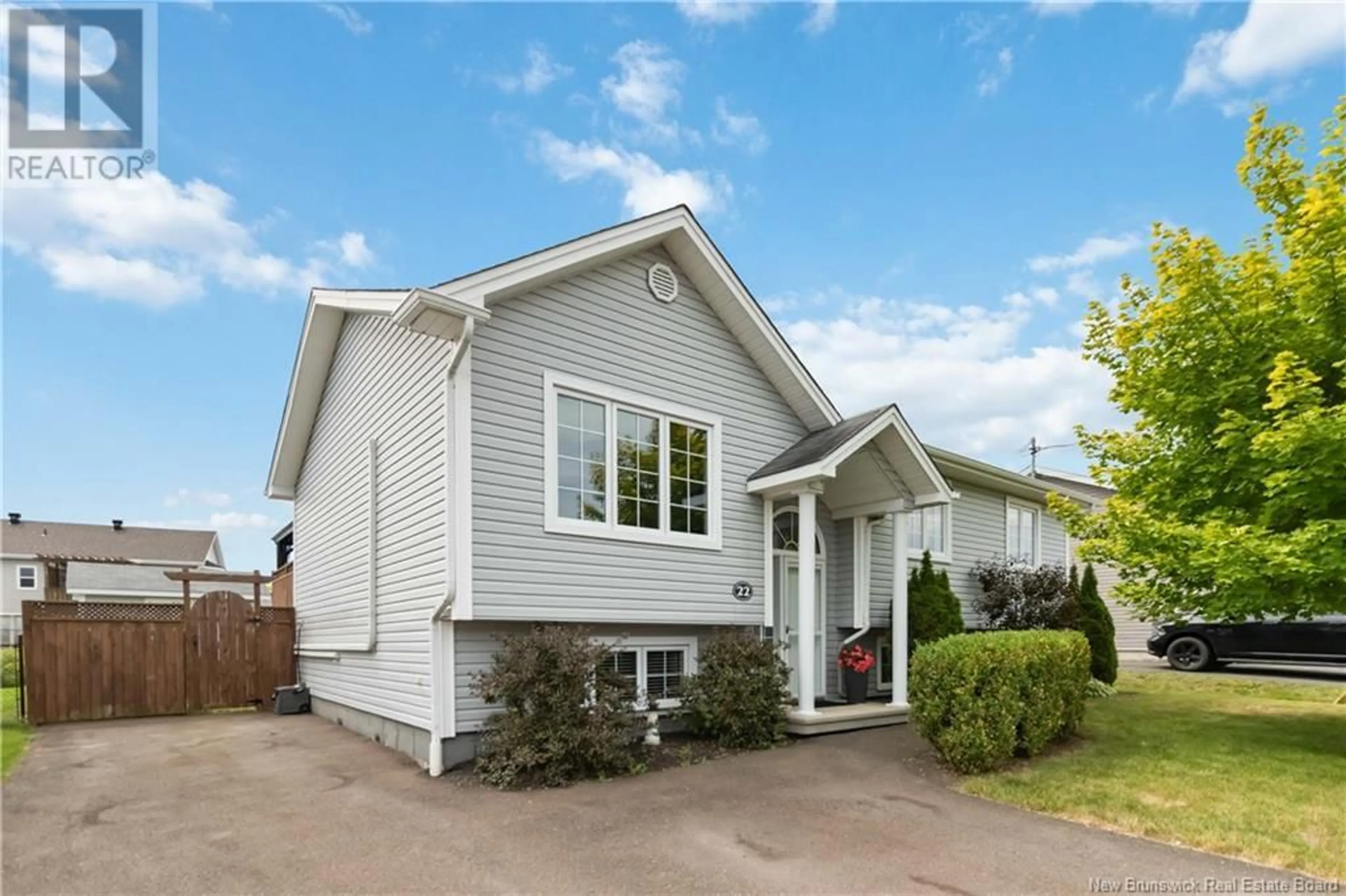 Home with vinyl exterior material, street for 22 FALCON DRIVE, Moncton New Brunswick E1G0H7