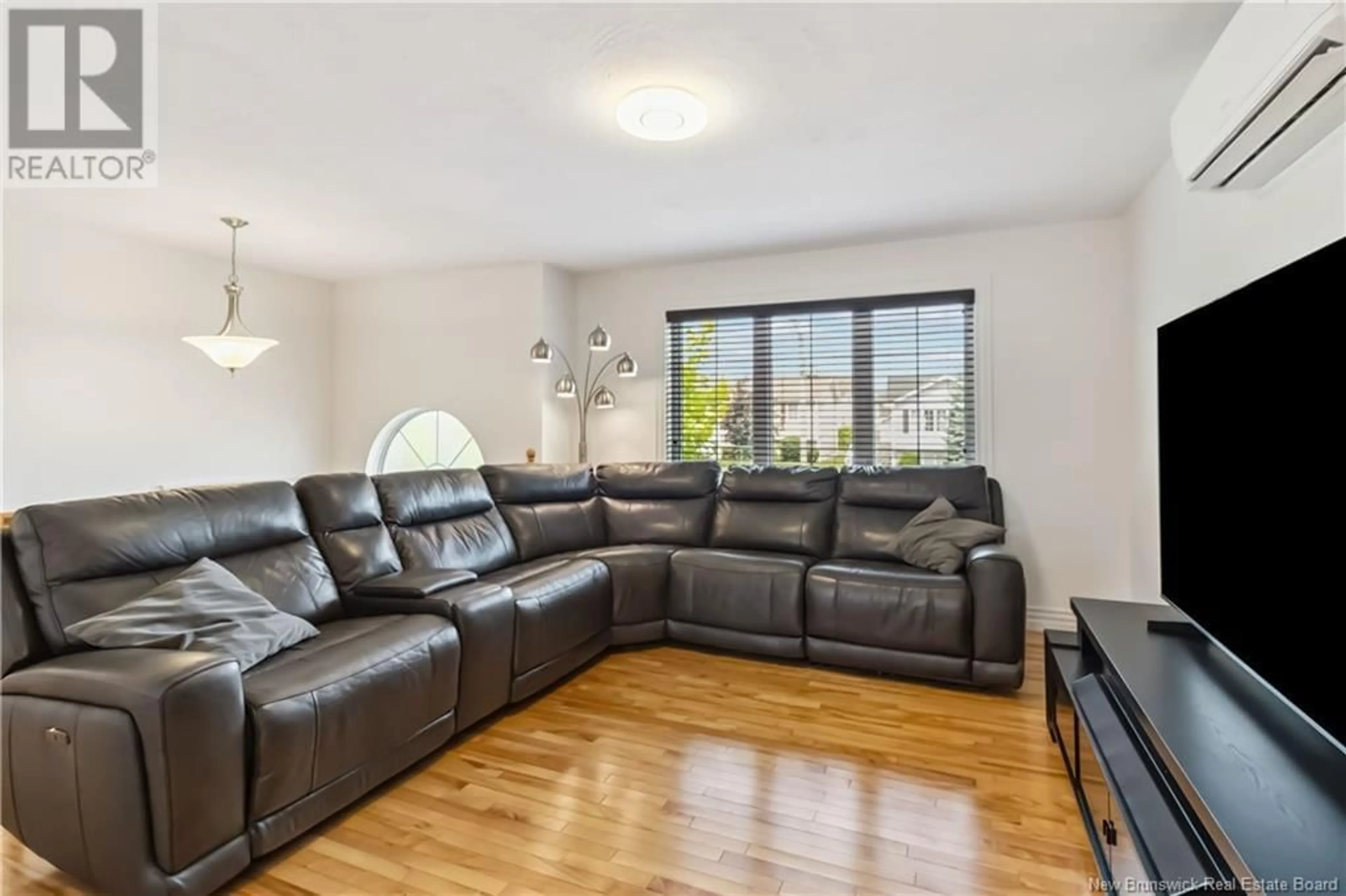 Living room with furniture, unknown for 22 FALCON DRIVE, Moncton New Brunswick E1G0H7