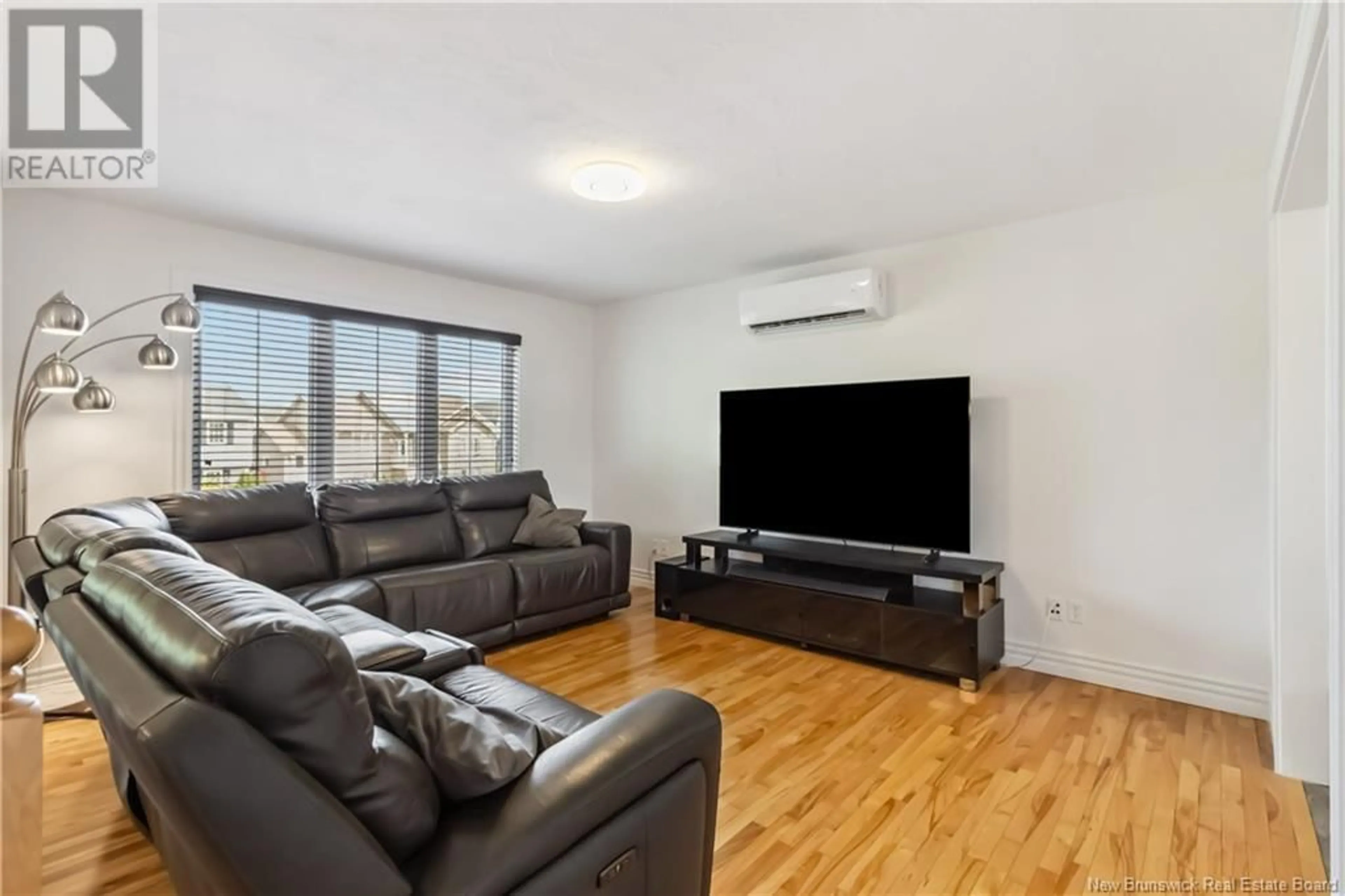Living room with furniture, unknown for 22 FALCON DRIVE, Moncton New Brunswick E1G0H7