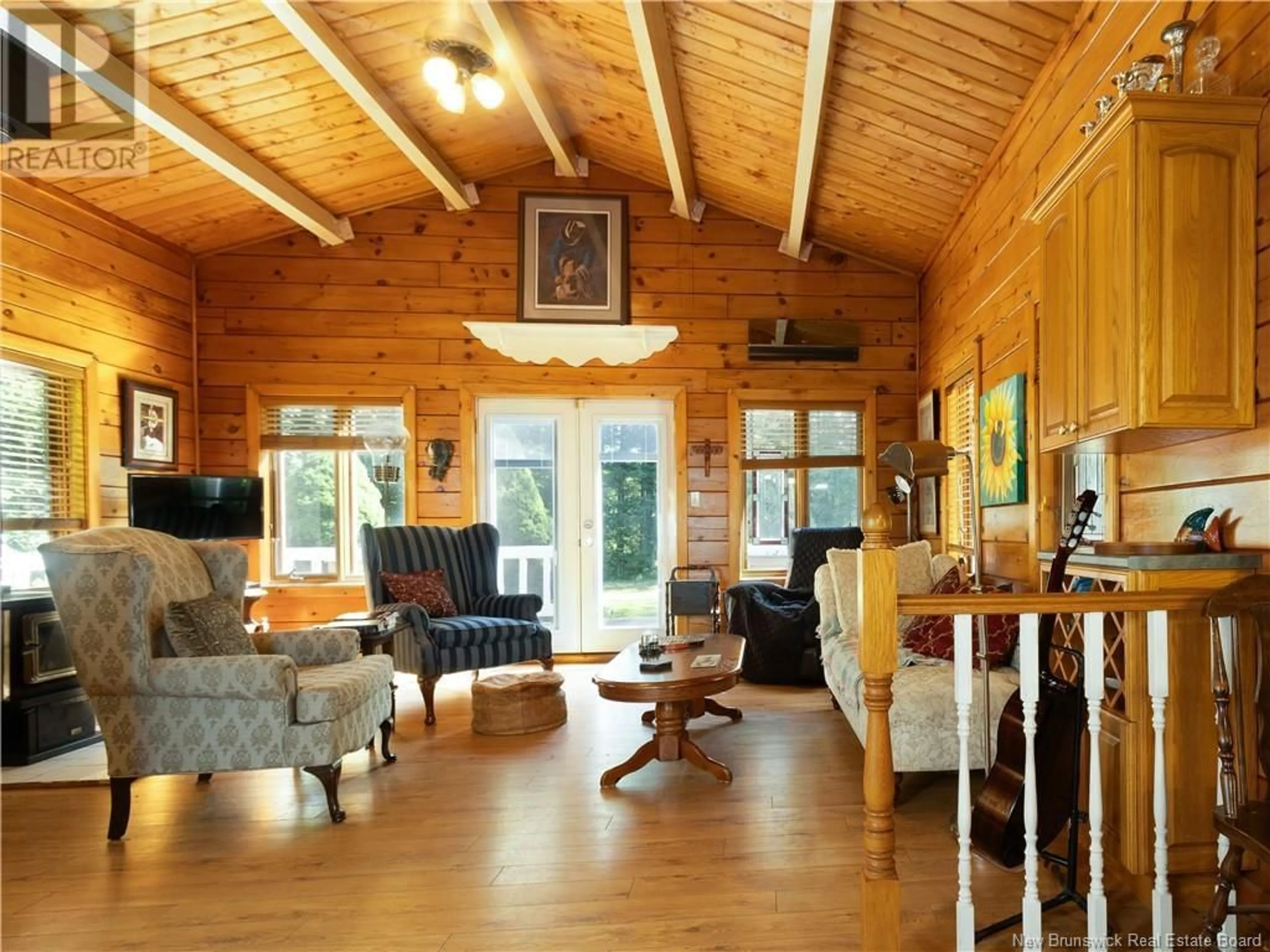 Living room with furniture, wood/laminate floor for 98 ONTARIO DRIVE, Salisbury New Brunswick E1G3W9