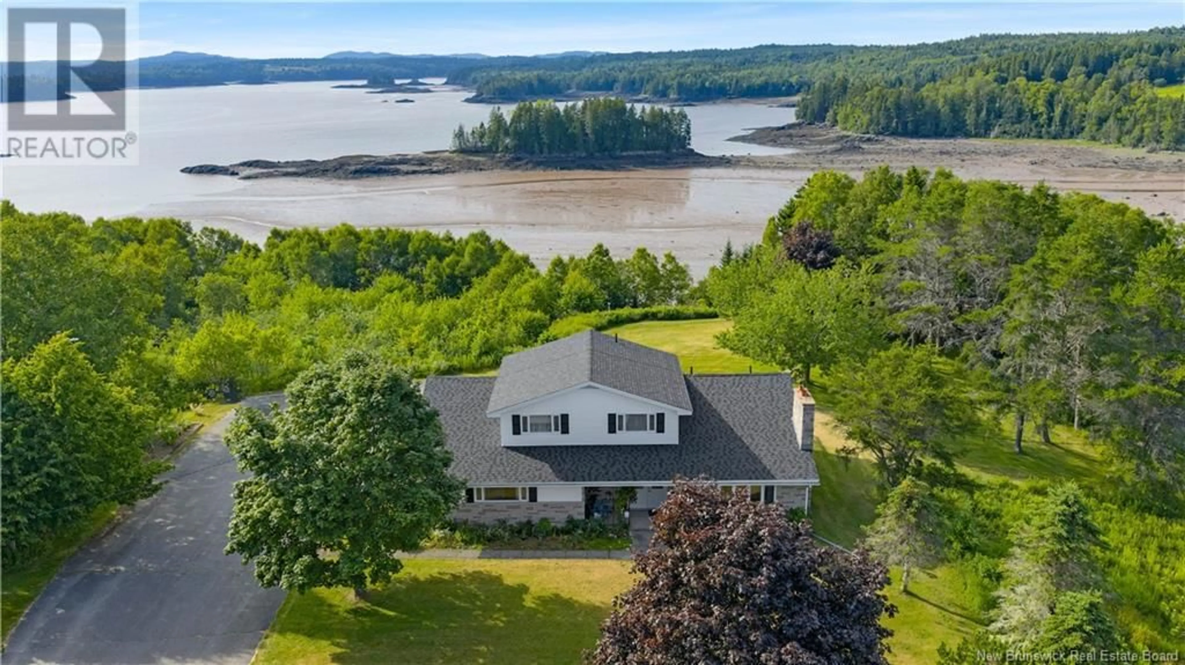A pic from outside/outdoor area/front of a property/back of a property/a pic from drone, water/lake/river/ocean view for 100 NASON STREET, Blacks Harbour New Brunswick E5H1A3