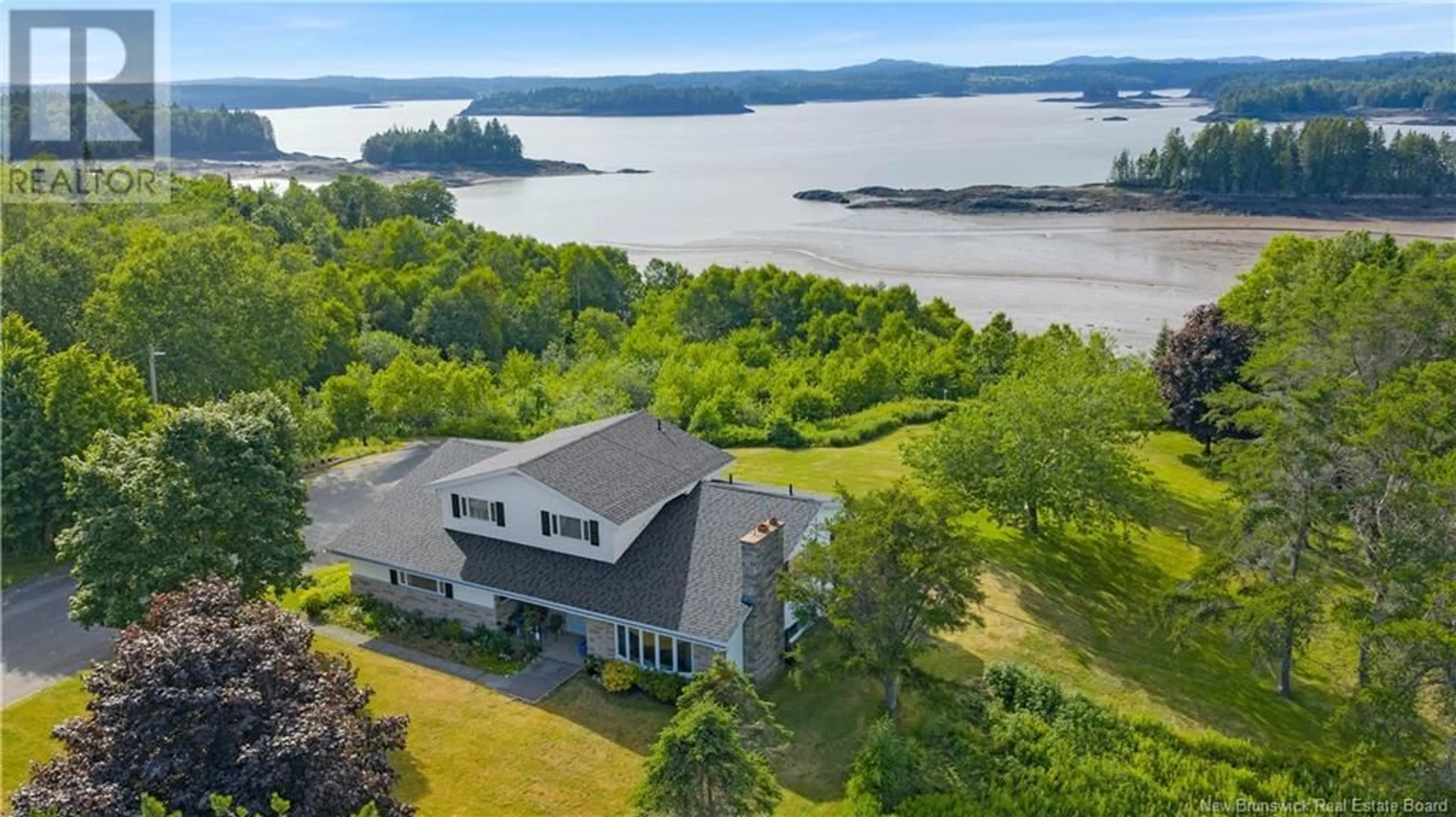 A pic from outside/outdoor area/front of a property/back of a property/a pic from drone, water/lake/river/ocean view for 100 NASON STREET, Blacks Harbour New Brunswick E5H1A3