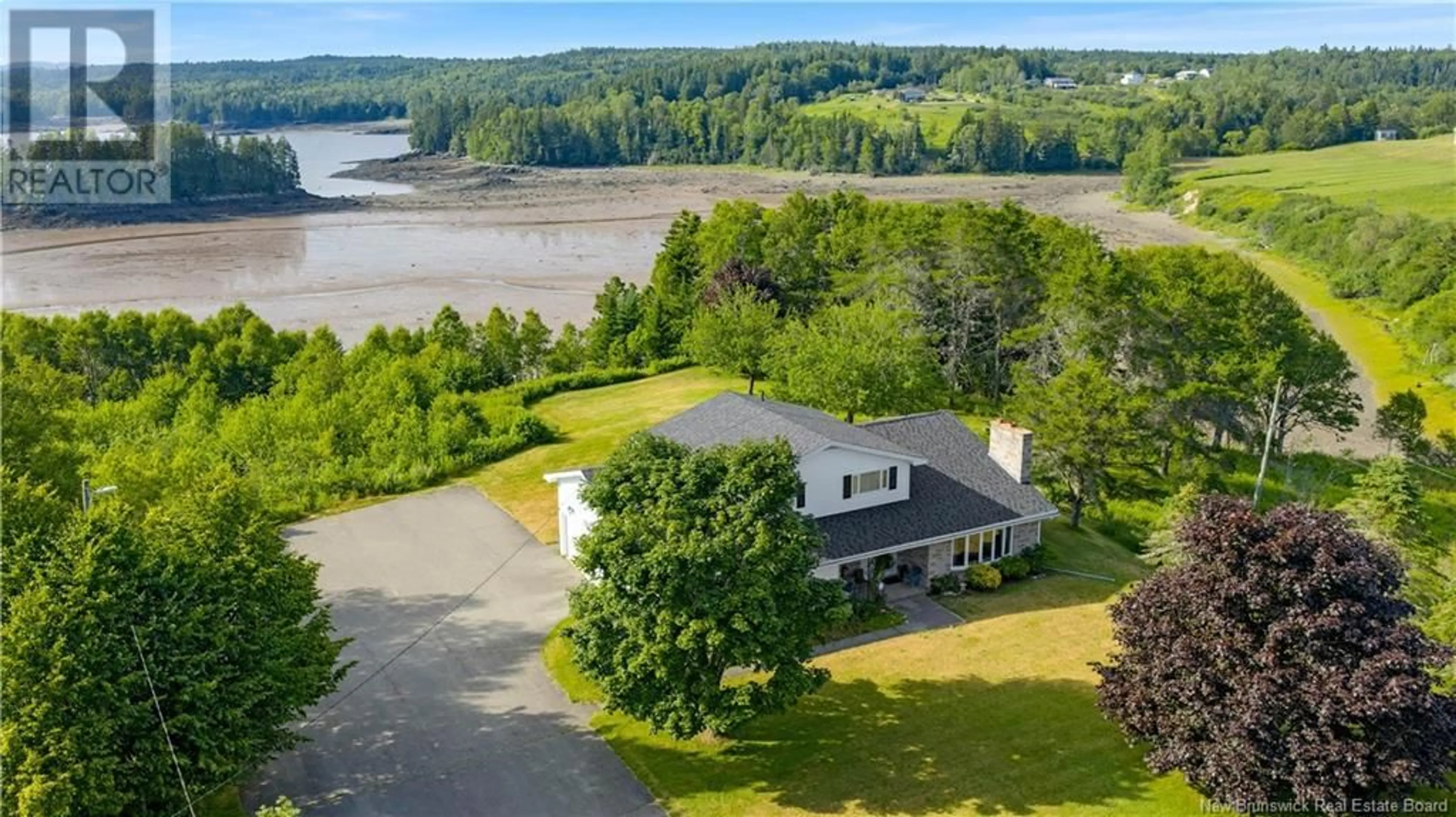 A pic from outside/outdoor area/front of a property/back of a property/a pic from drone, water/lake/river/ocean view for 100 NASON STREET, Blacks Harbour New Brunswick E5H1A3