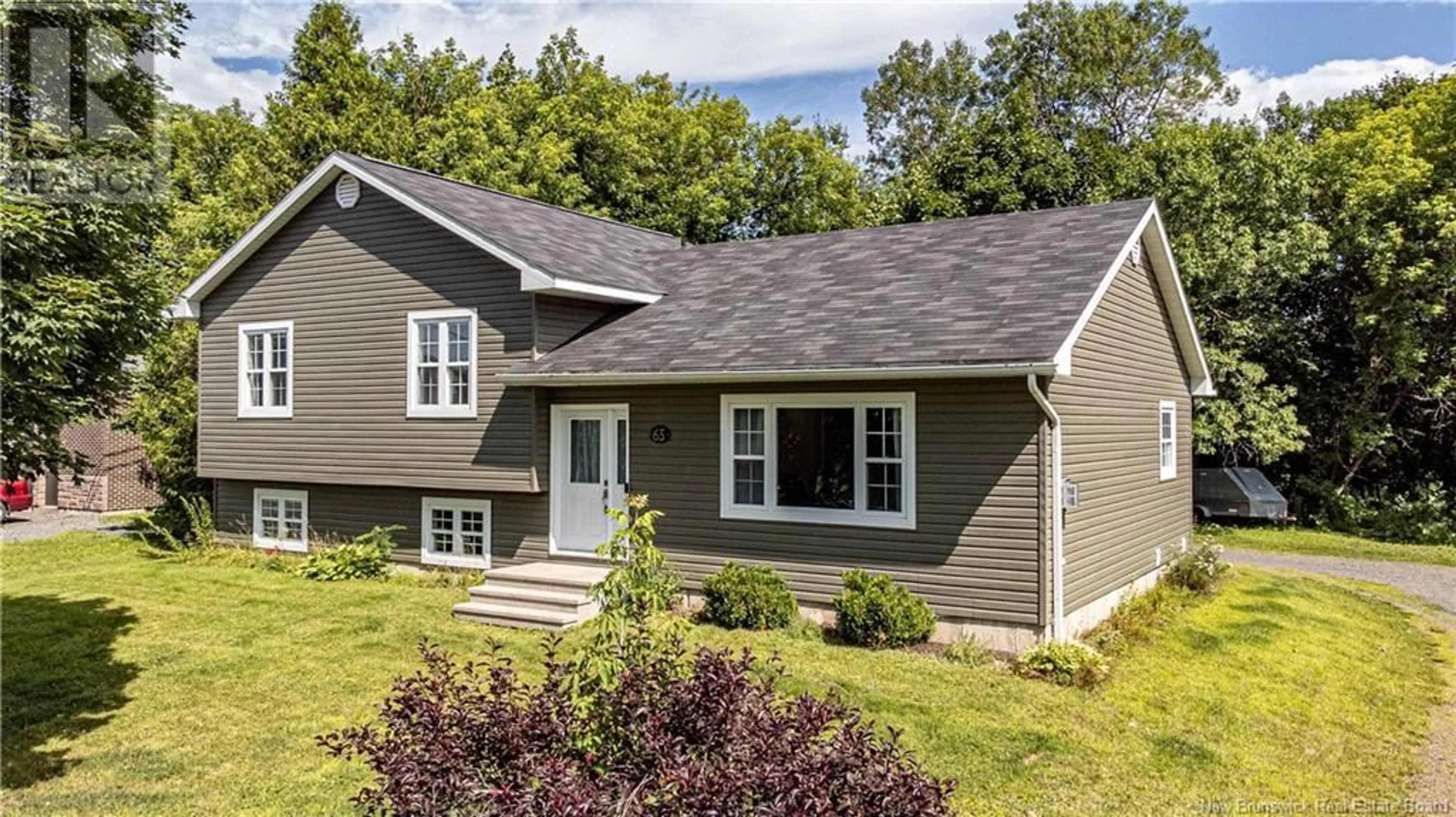 Home with vinyl exterior material, street for 65 AQUARIUS STREET, Fredericton New Brunswick E3B8P5
