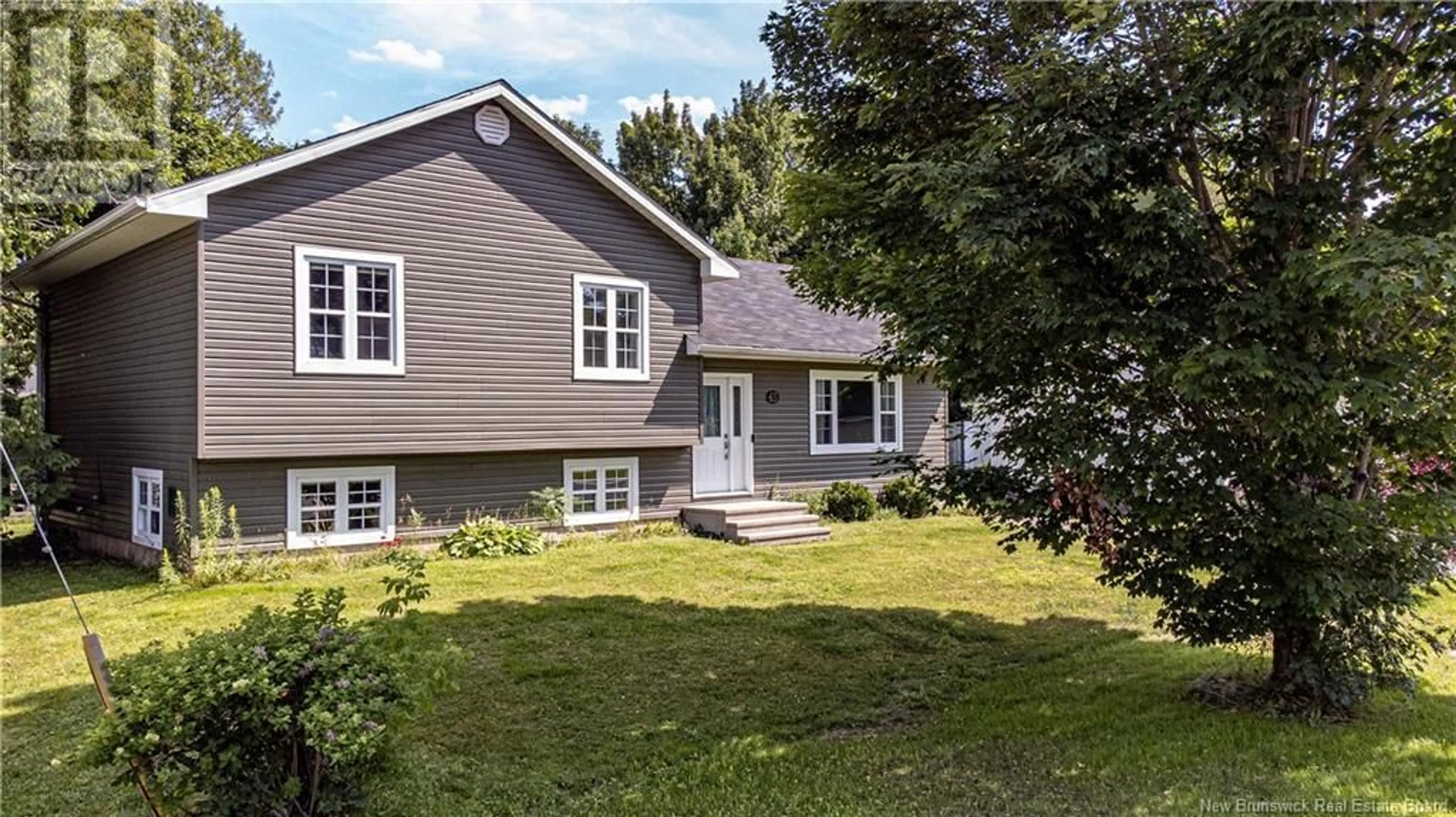 Home with vinyl exterior material, street for 65 AQUARIUS STREET, Fredericton New Brunswick E3B8P5