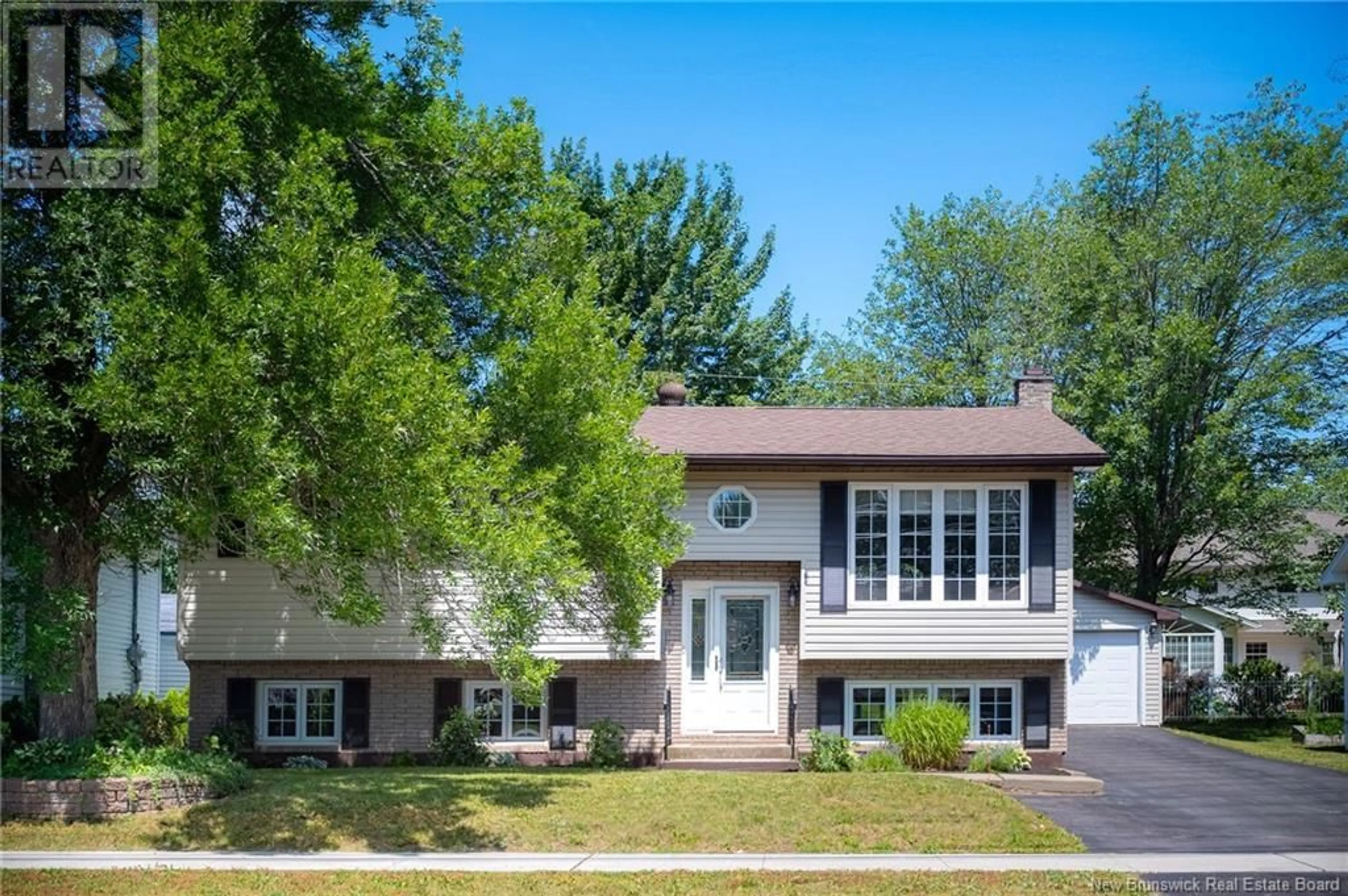 Home with vinyl exterior material, street for 223 HENNESSEY ROAD, Moncton New Brunswick E1A5P2