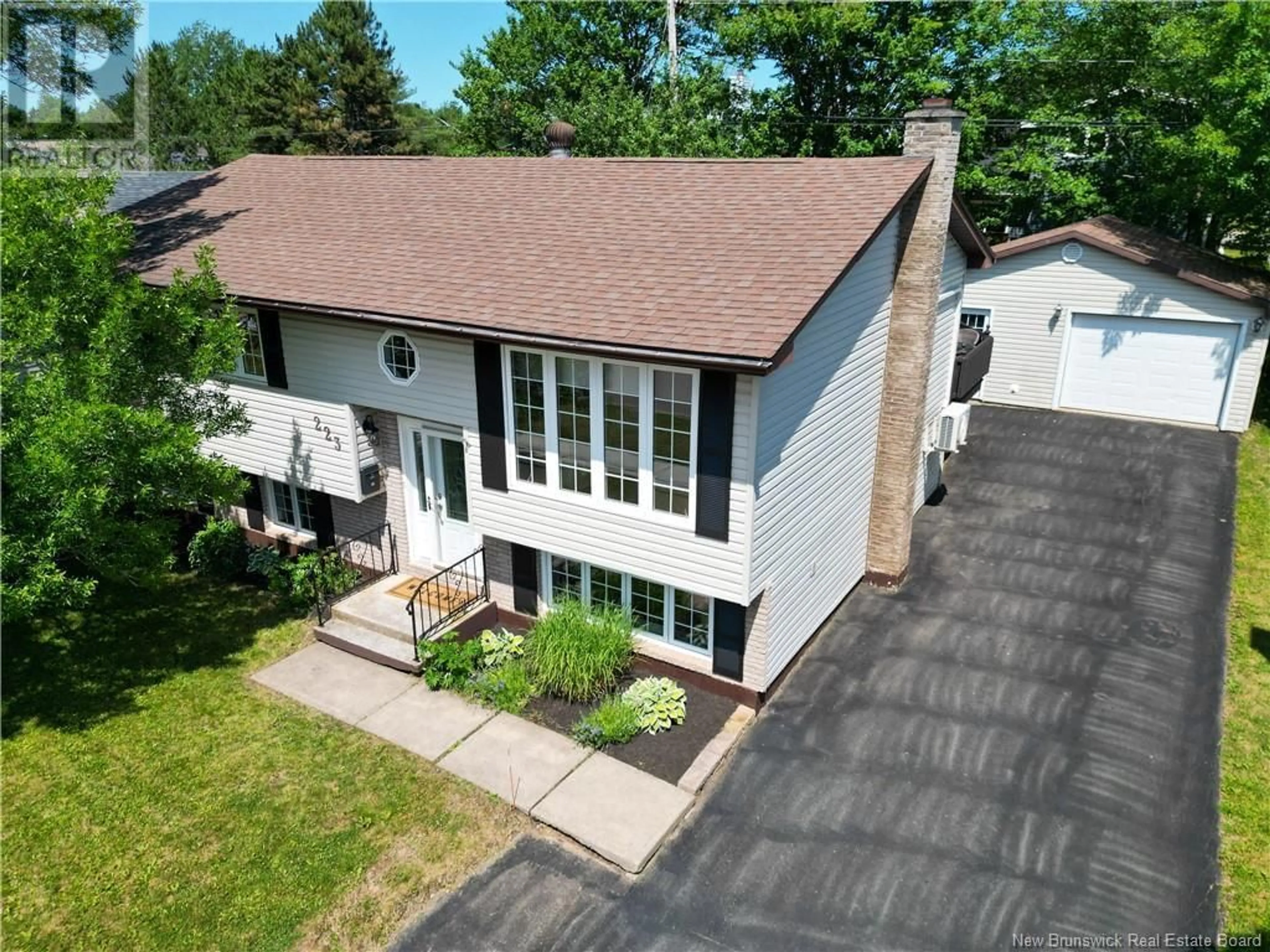 A pic from outside/outdoor area/front of a property/back of a property/a pic from drone, street for 223 HENNESSEY ROAD, Moncton New Brunswick E1A5P2