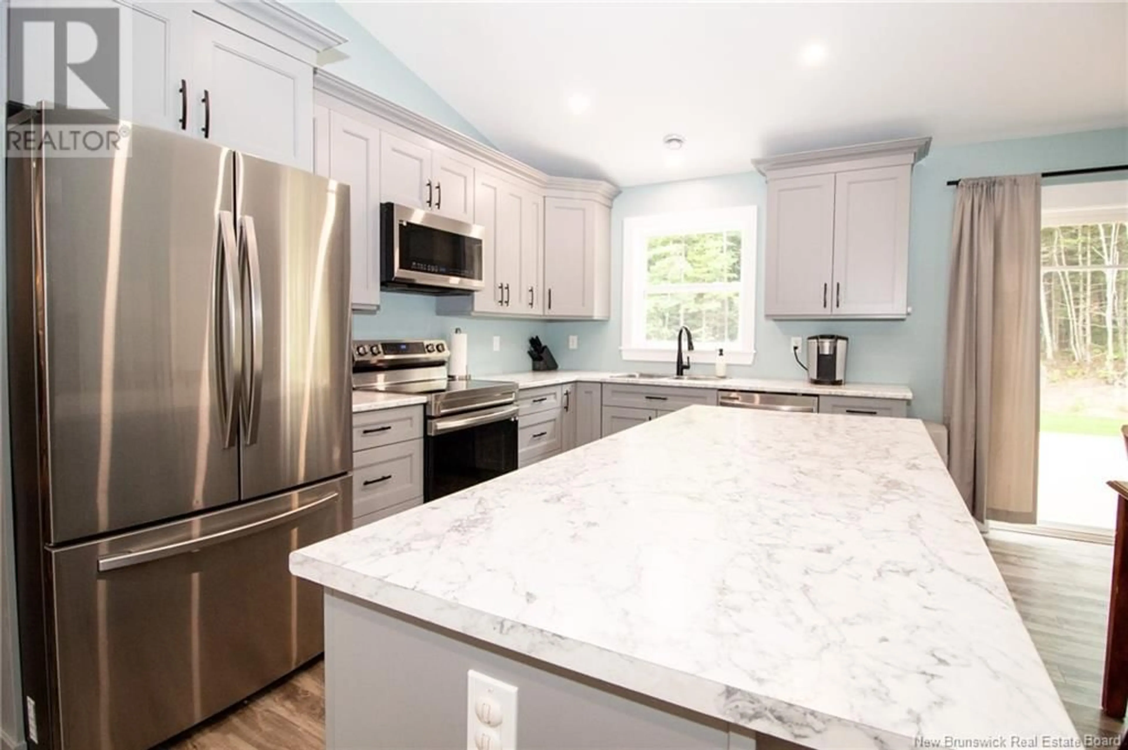 Open concept kitchen, ceramic/tile floor for 78 MCMANUS STREET, Passekeag New Brunswick E5N7S5