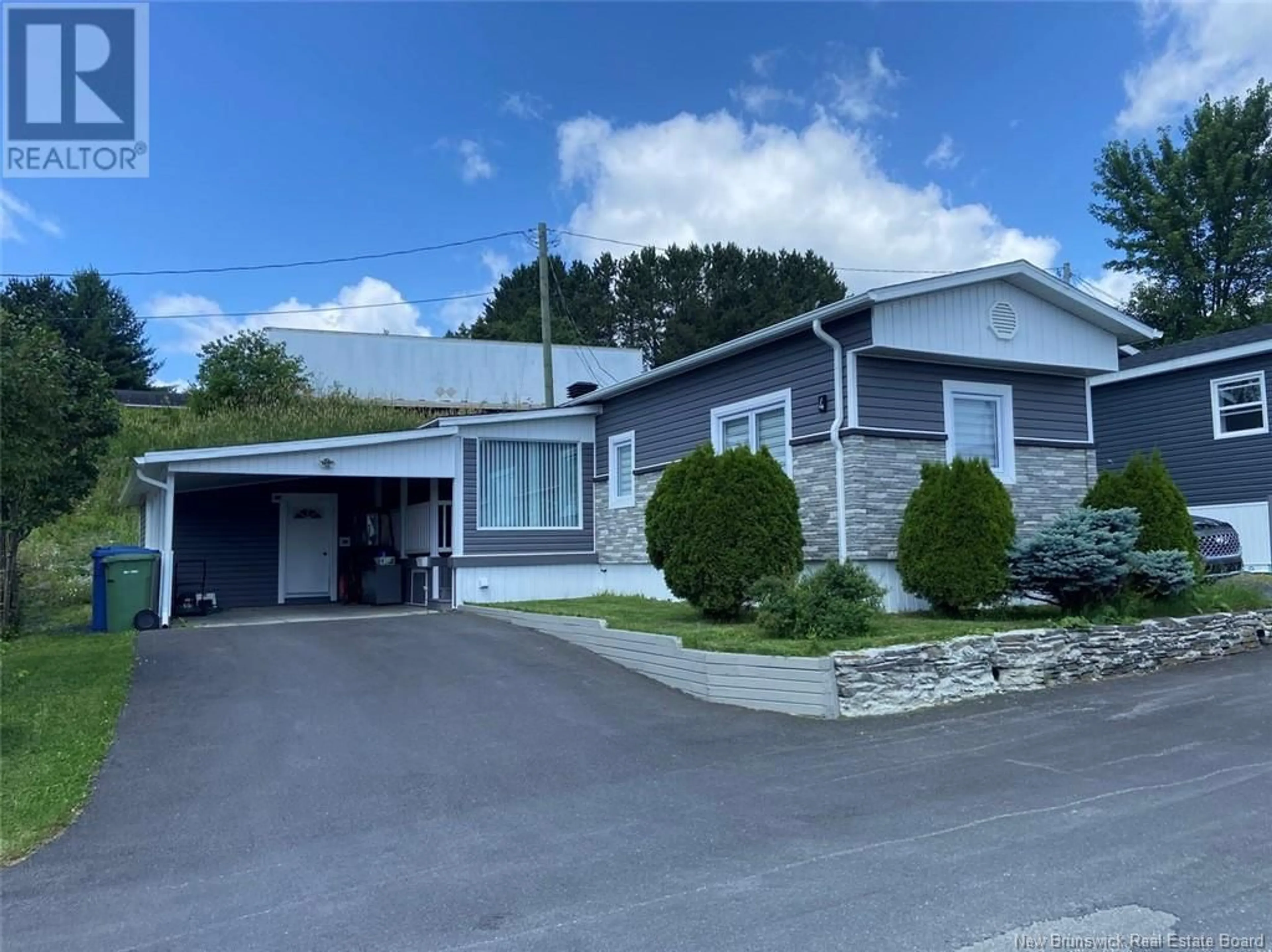 Home with vinyl exterior material, street for 4 GAGNON AVENUE, Edmundston New Brunswick E3V3H8