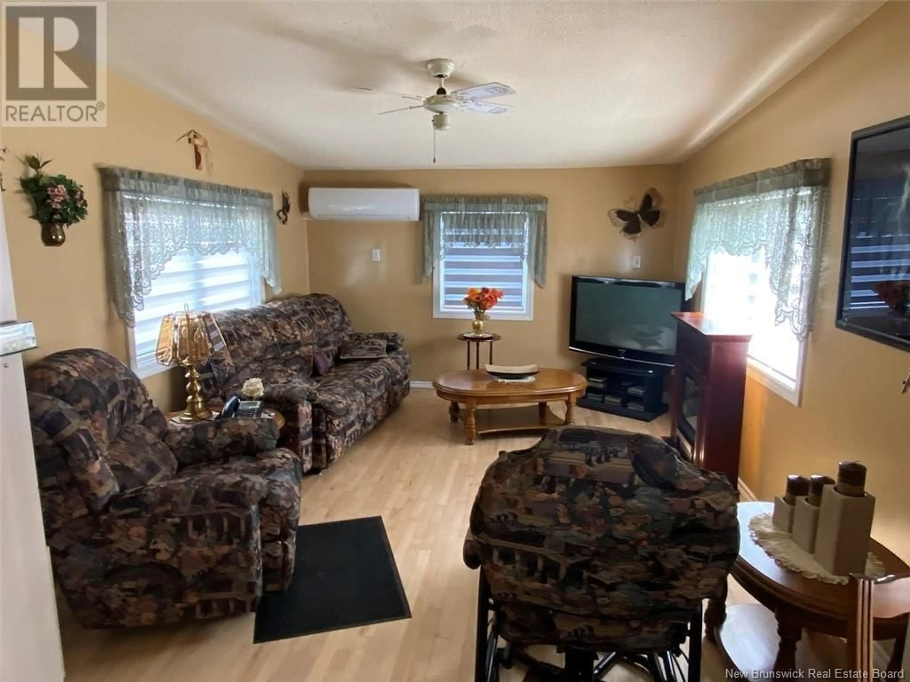 Living room with furniture, unknown for 4 GAGNON AVENUE, Edmundston New Brunswick E3V3H8