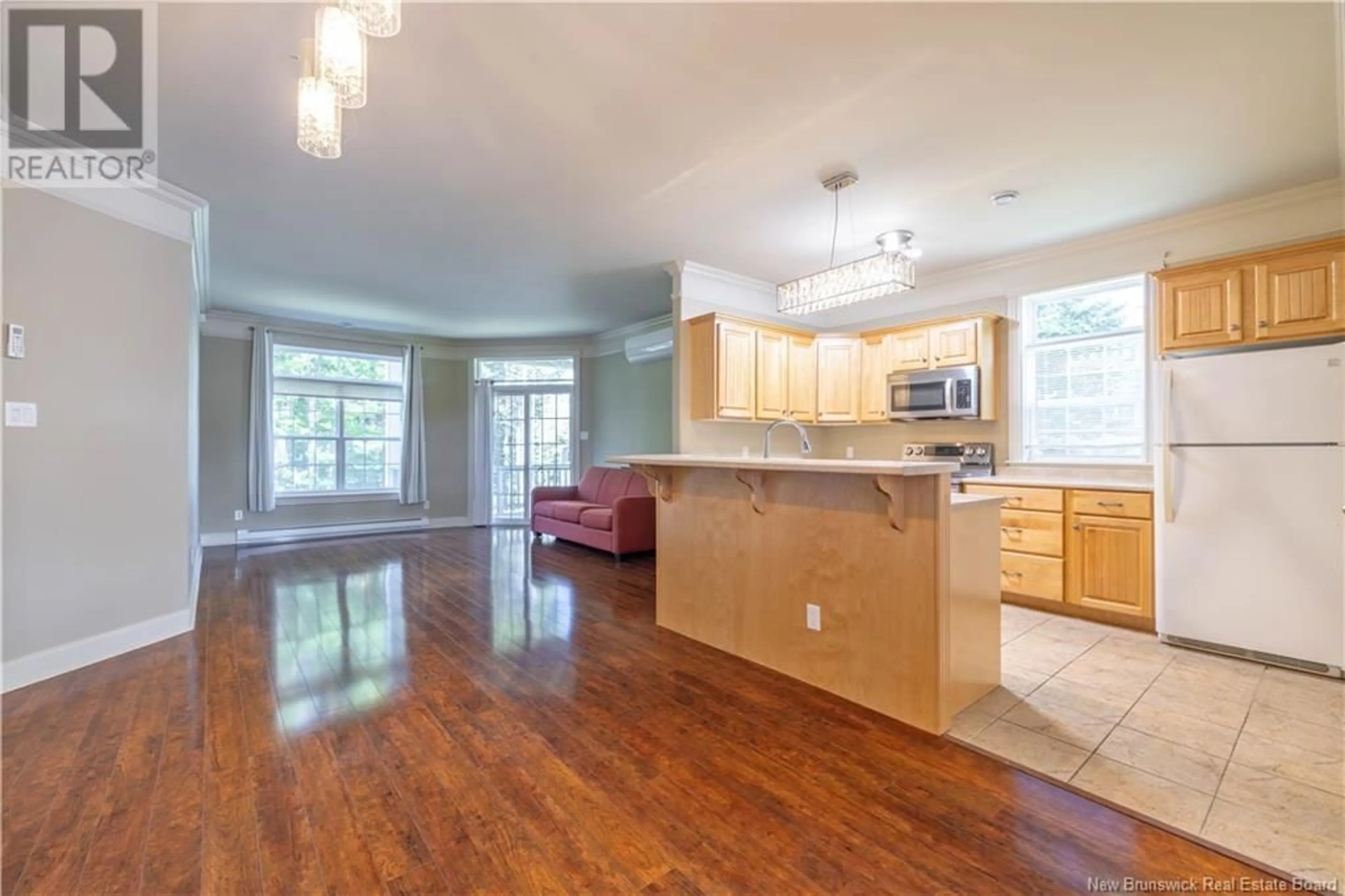 Open concept kitchen, wood/laminate floor for 8 TRANQUILITY LANE, Quispamsis New Brunswick E2E0H8