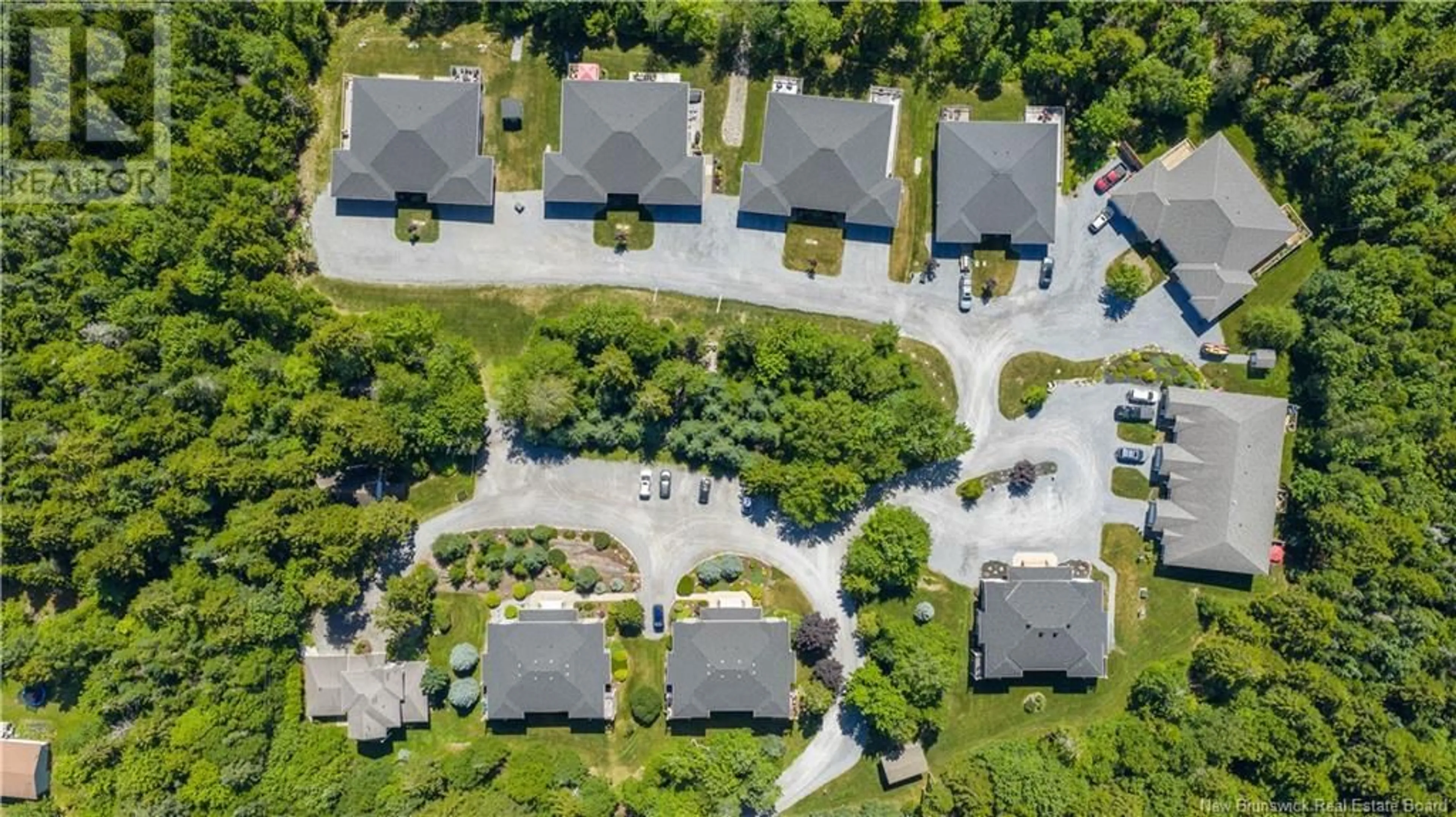 A pic from outside/outdoor area/front of a property/back of a property/a pic from drone, street for 8 TRANQUILITY LANE, Quispamsis New Brunswick E2E0H8