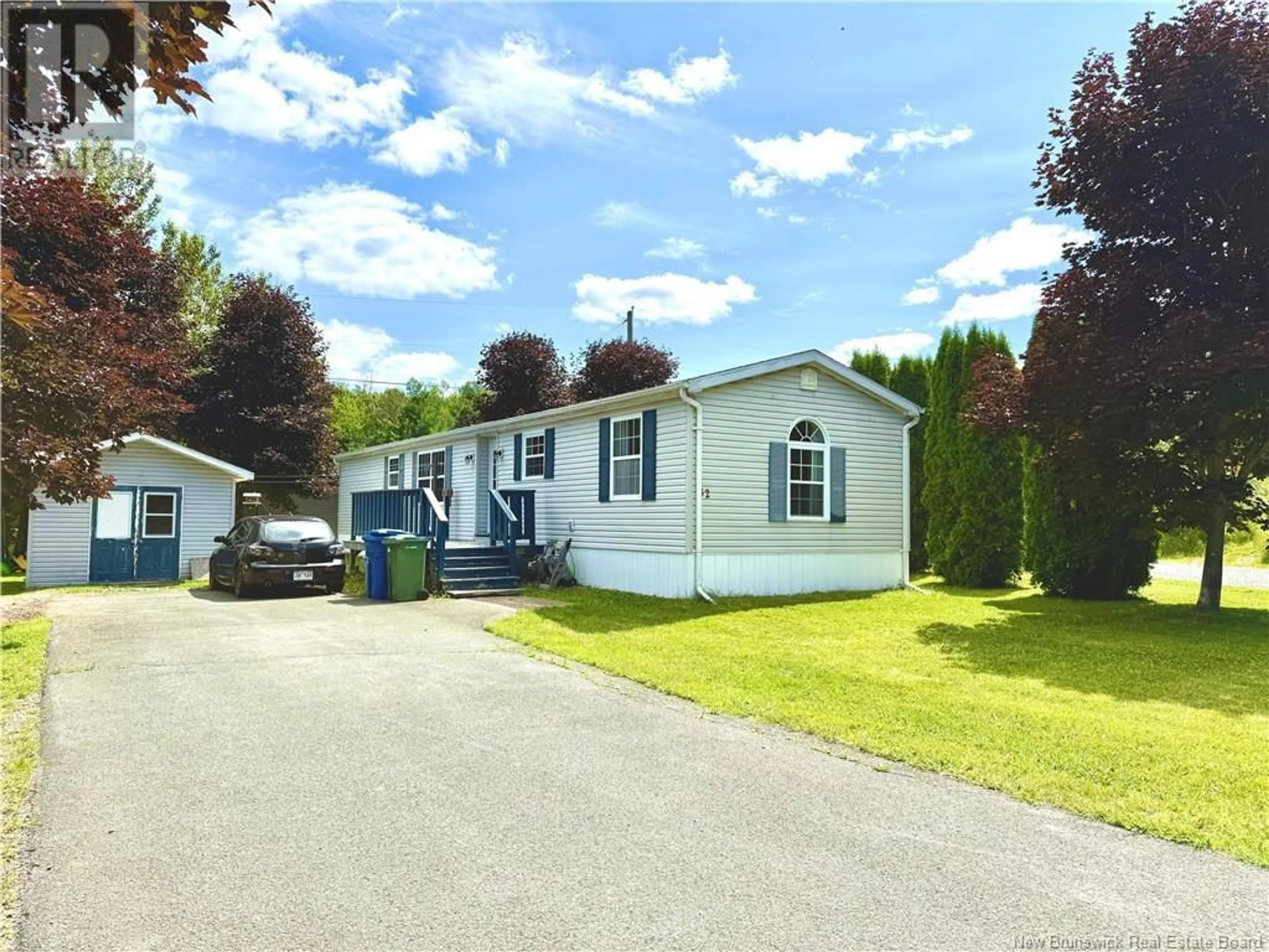 Home with vinyl exterior material, street for 32 MAPLE GREEN CRESCENT, Dalhousie Junction New Brunswick E3N5Z3