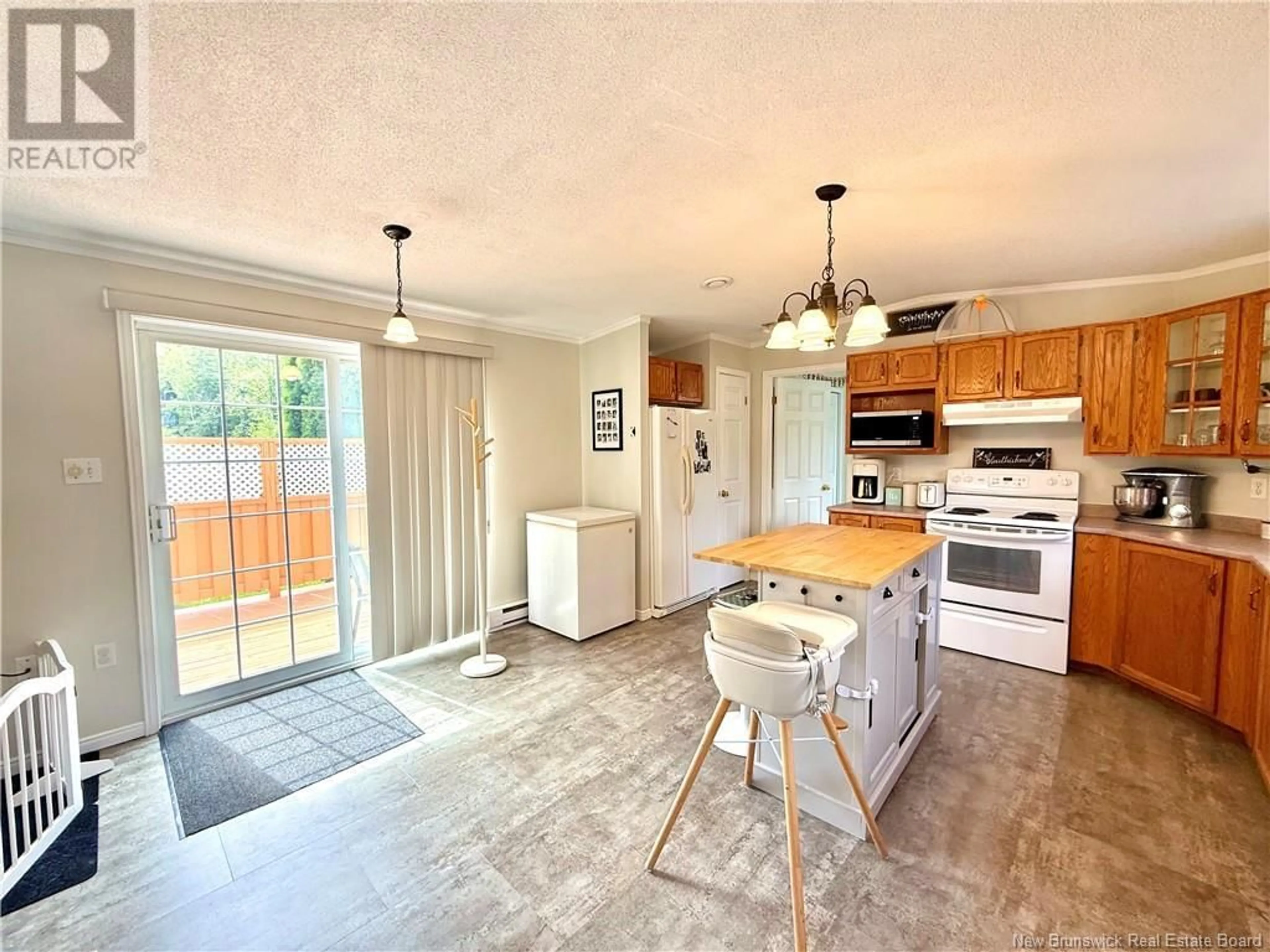 Open concept kitchen, ceramic/tile floor for 32 MAPLE GREEN CRESCENT, Dalhousie Junction New Brunswick E3N5Z3