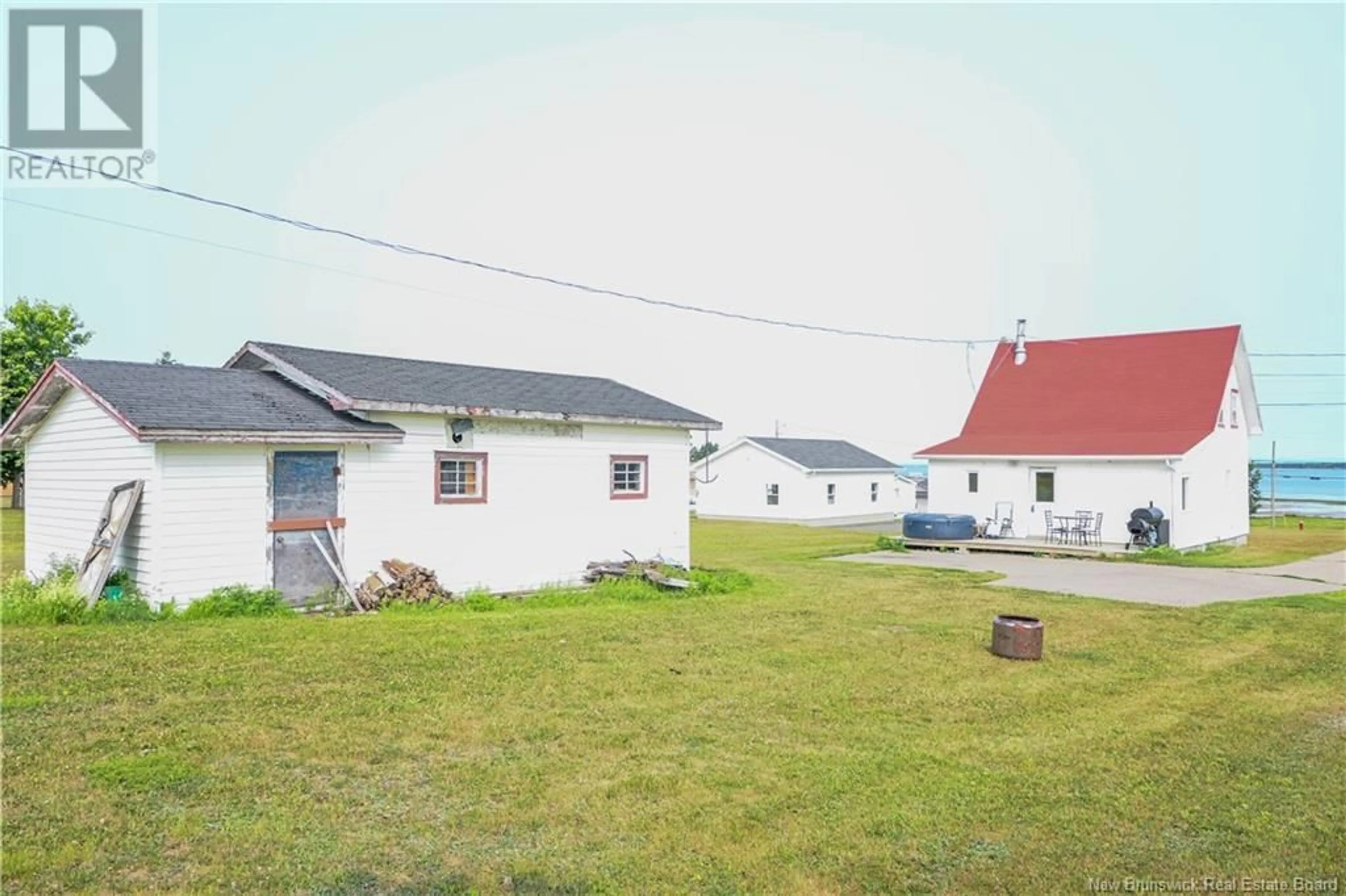 A pic from outside/outdoor area/front of a property/back of a property/a pic from drone, building for 7578 SAINT-PAUL STREET, Bas-Caraquet New Brunswick E1W6C8
