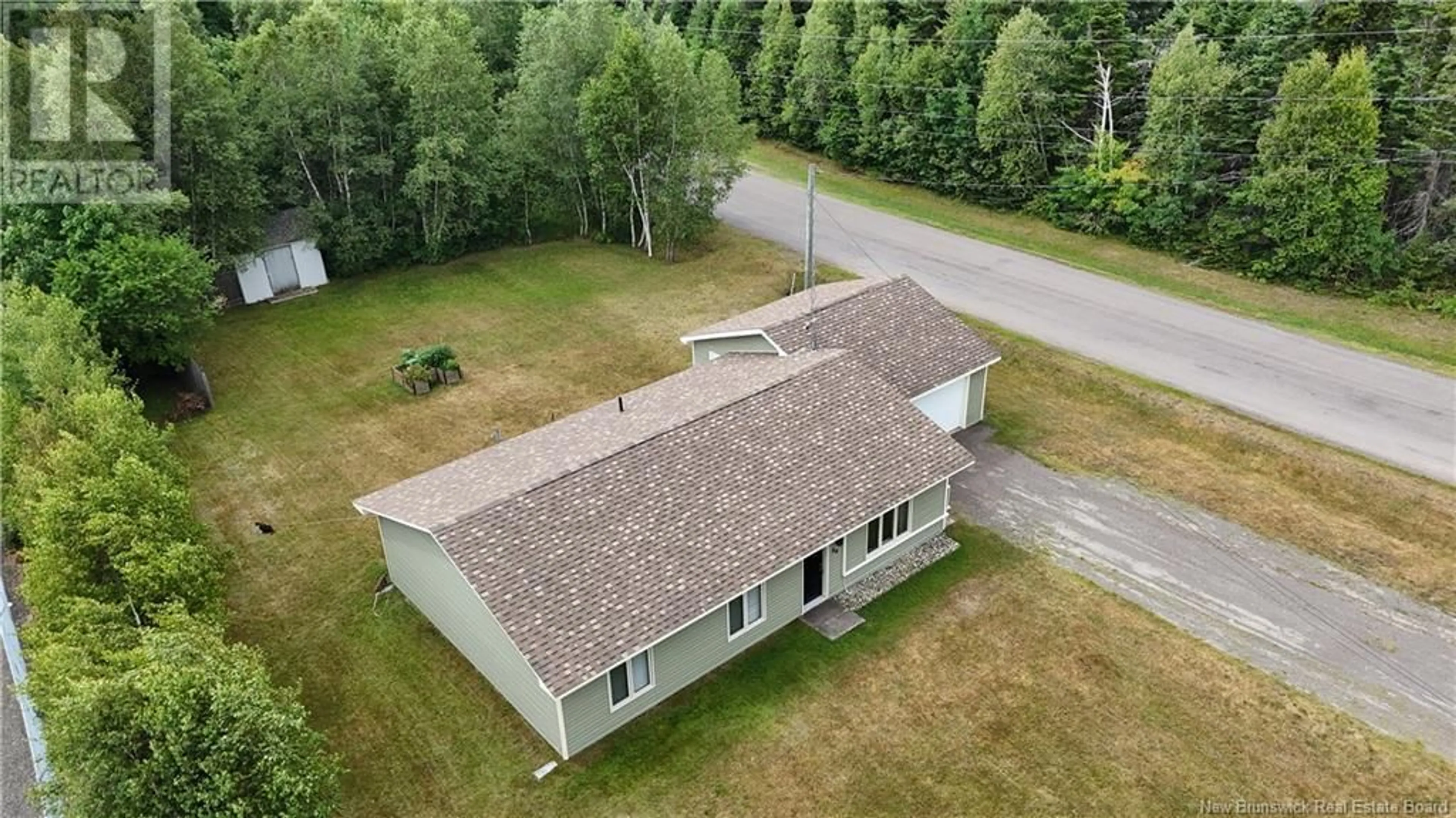 A pic from outside/outdoor area/front of a property/back of a property/a pic from drone, building for 69 CENTENNIAL WEST AVENUE, Rexton New Brunswick E4W1X6