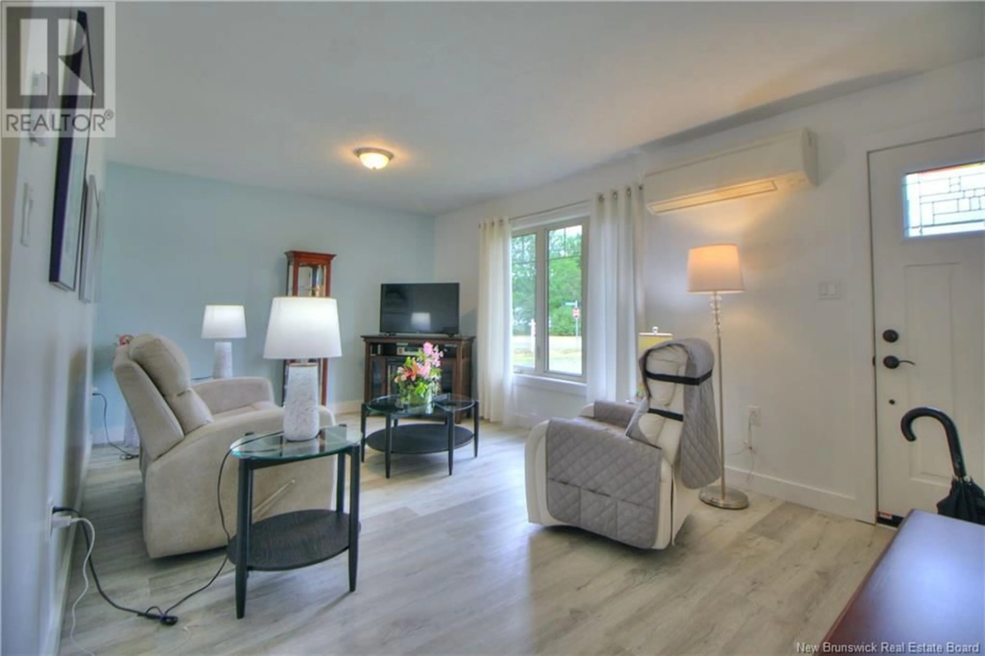 Living room with furniture, wood/laminate floor for 69 CENTENNIAL WEST AVENUE, Rexton New Brunswick E4W1X6