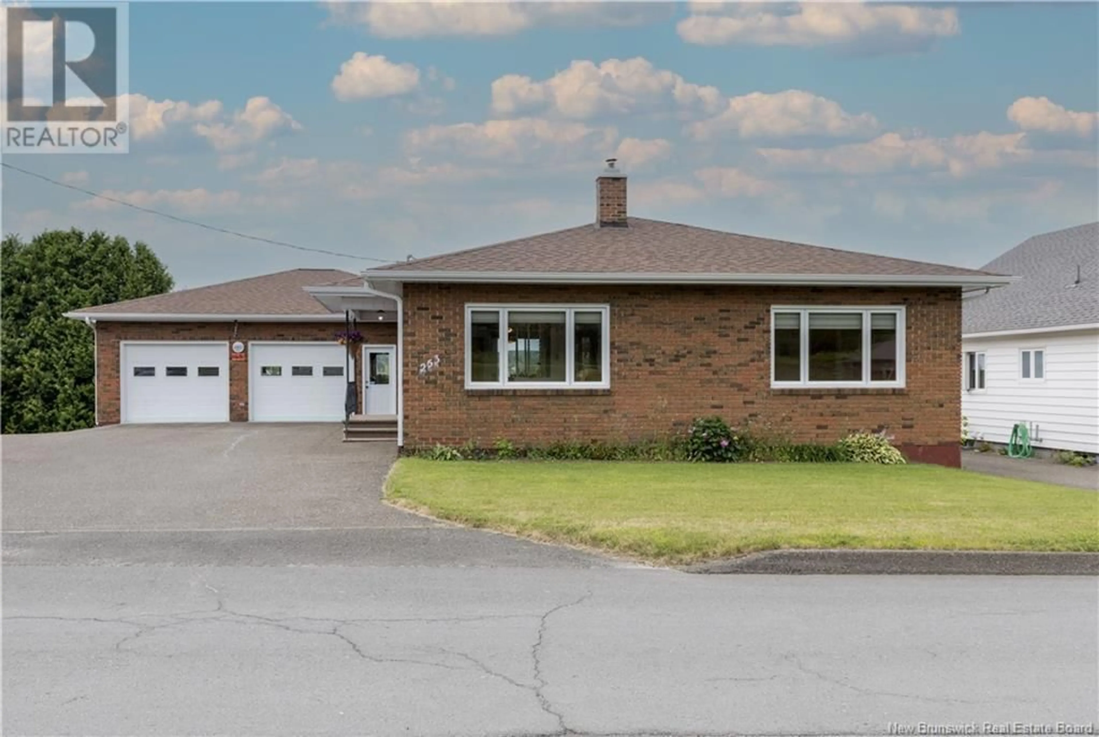 Home with brick exterior material, street for 253 ST-GEORGES STREET, Grand-Sault/Grand Falls New Brunswick E3Y1C4