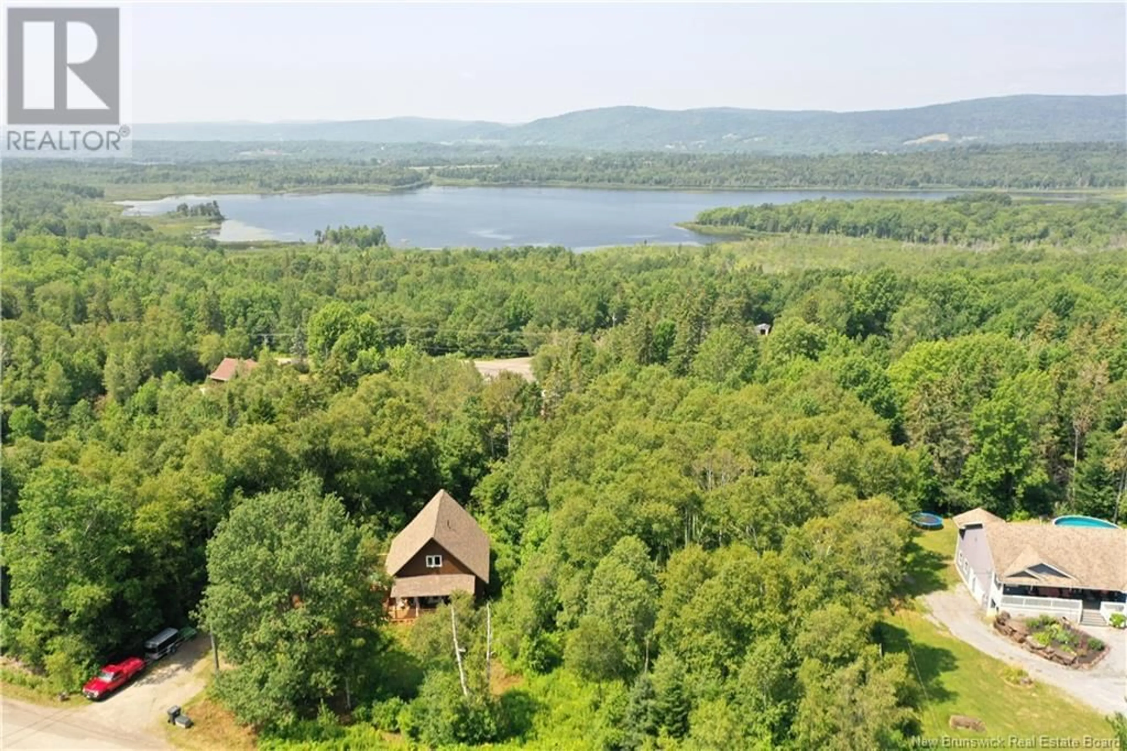 A pic from outside/outdoor area/front of a property/back of a property/a pic from drone, water/lake/river/ocean view for 9 ORCHARD STREET, Passekeag New Brunswick E5N2B8