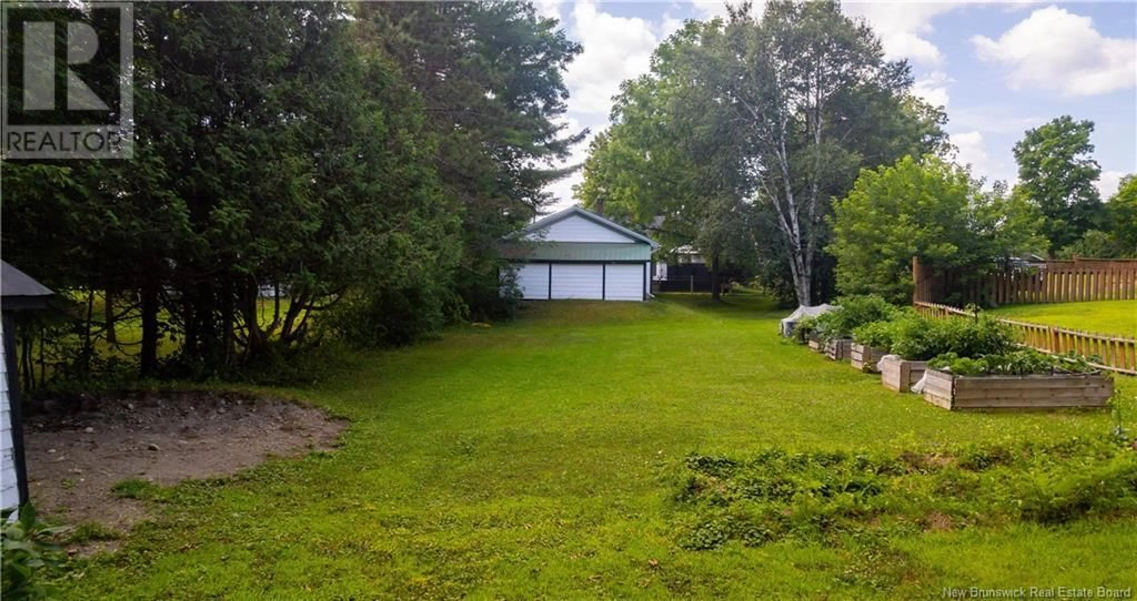 A pic from outside/outdoor area/front of a property/back of a property/a pic from drone, water/lake/river/ocean view for 27 HILL STREET, St. Stephen New Brunswick E3L1N6