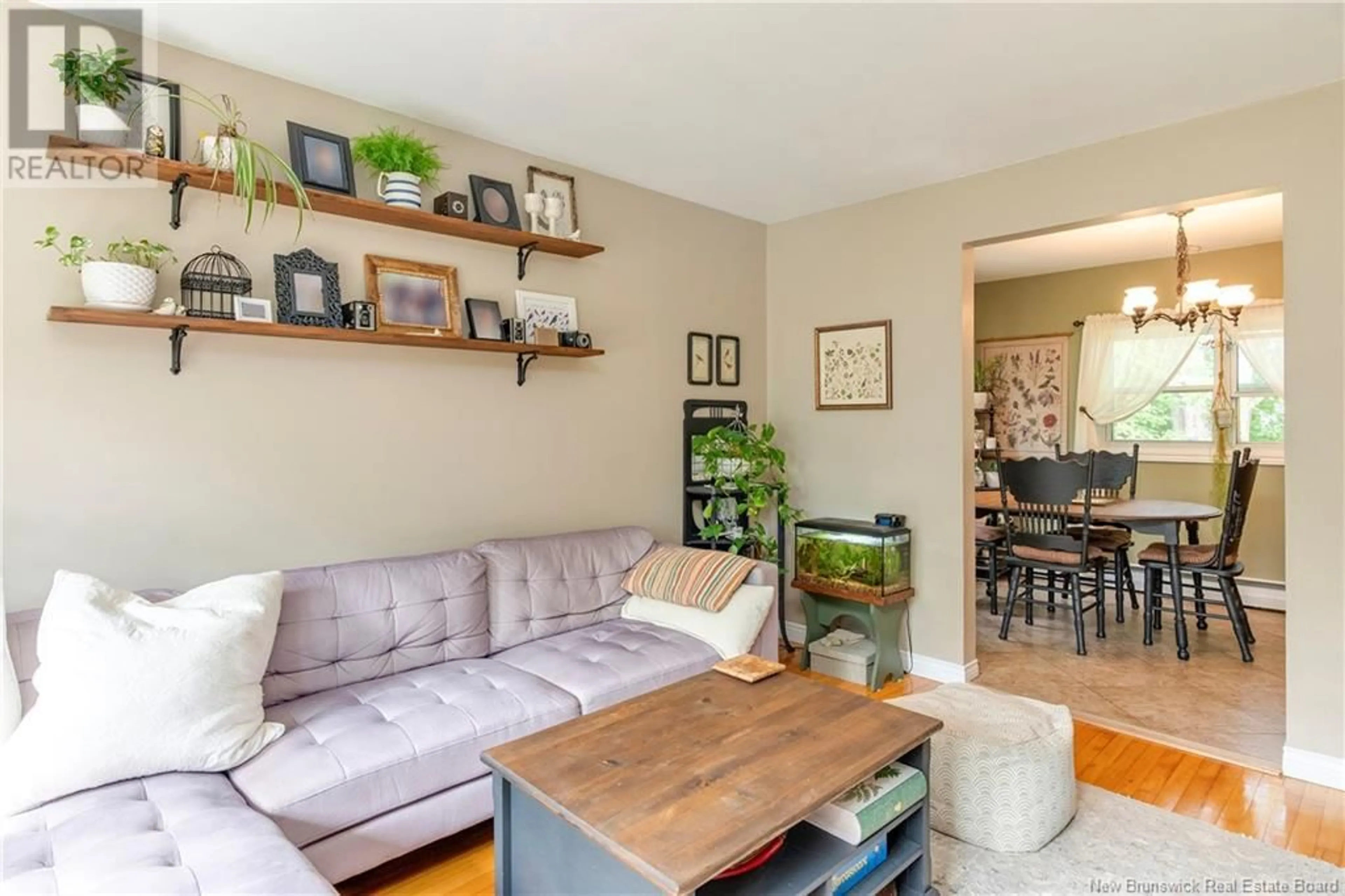 Living room with furniture, wood/laminate floor for 229 OGDEN DRIVE, Riverview New Brunswick E1B2S5