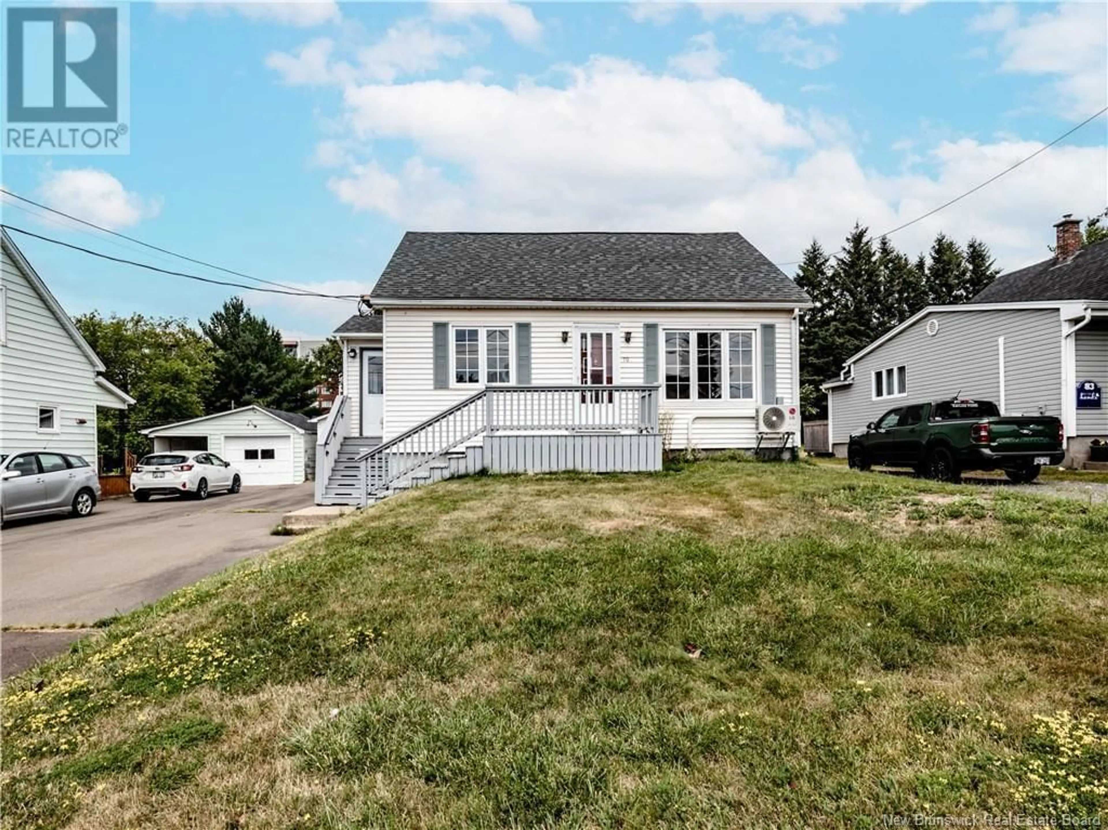 Home with vinyl exterior material, street for 79 OLIVIER, Dieppe New Brunswick E1A1S3