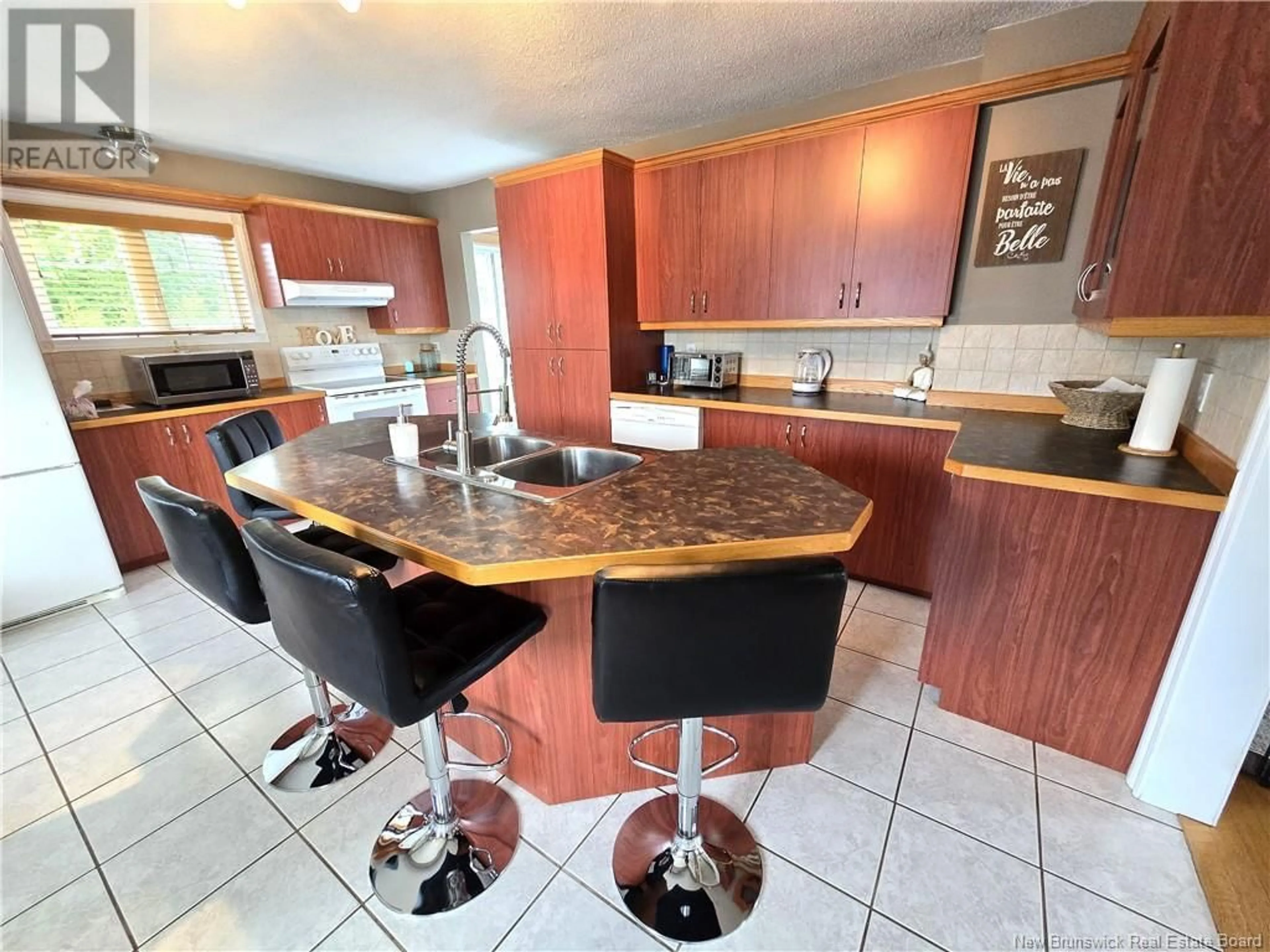 Open concept kitchen, ceramic/tile floor for 120 34E AVENUE, Edmundston New Brunswick E3V2T6