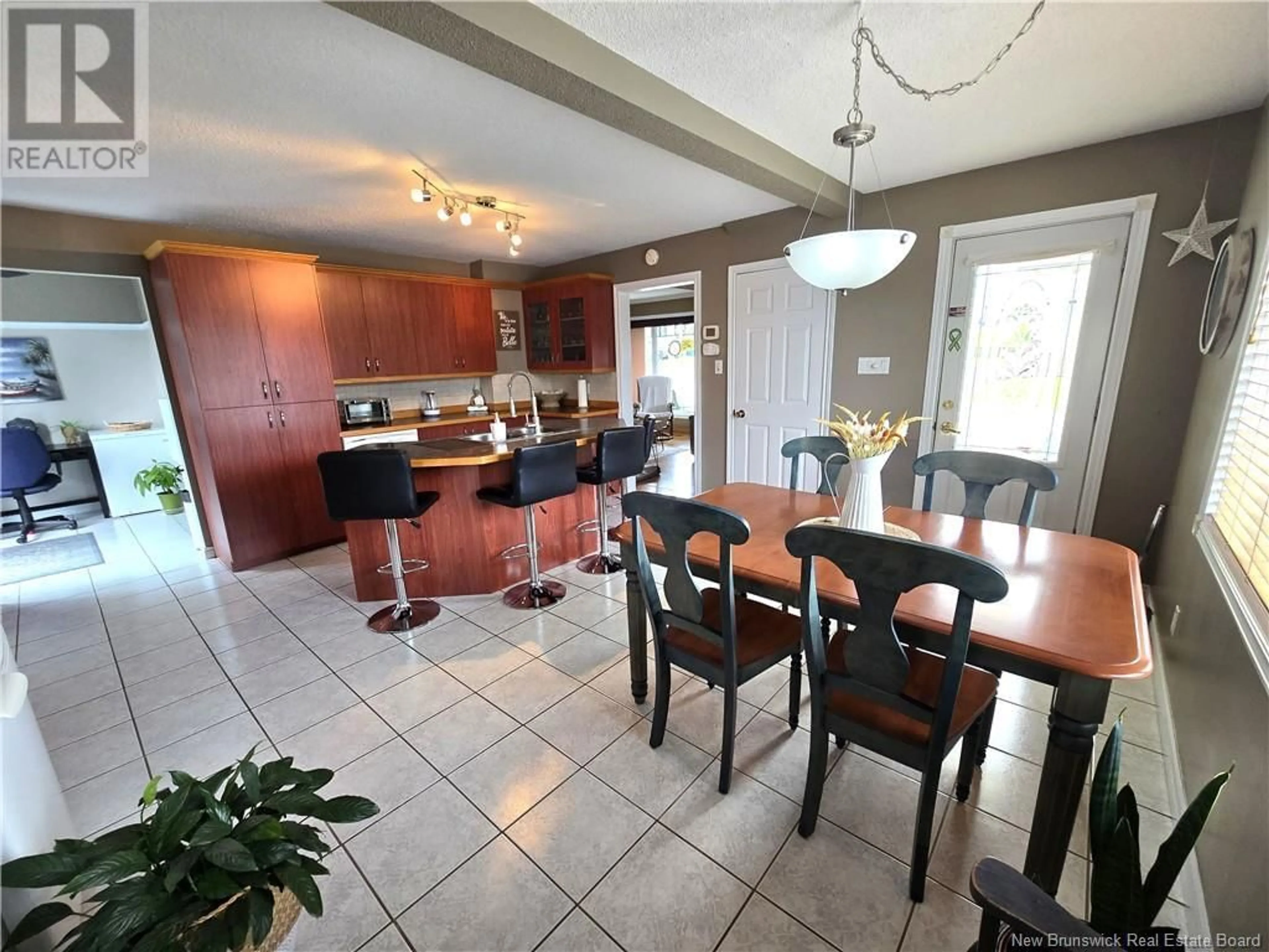 Open concept kitchen, ceramic/tile floor for 120 34E AVENUE, Edmundston New Brunswick E3V2T6