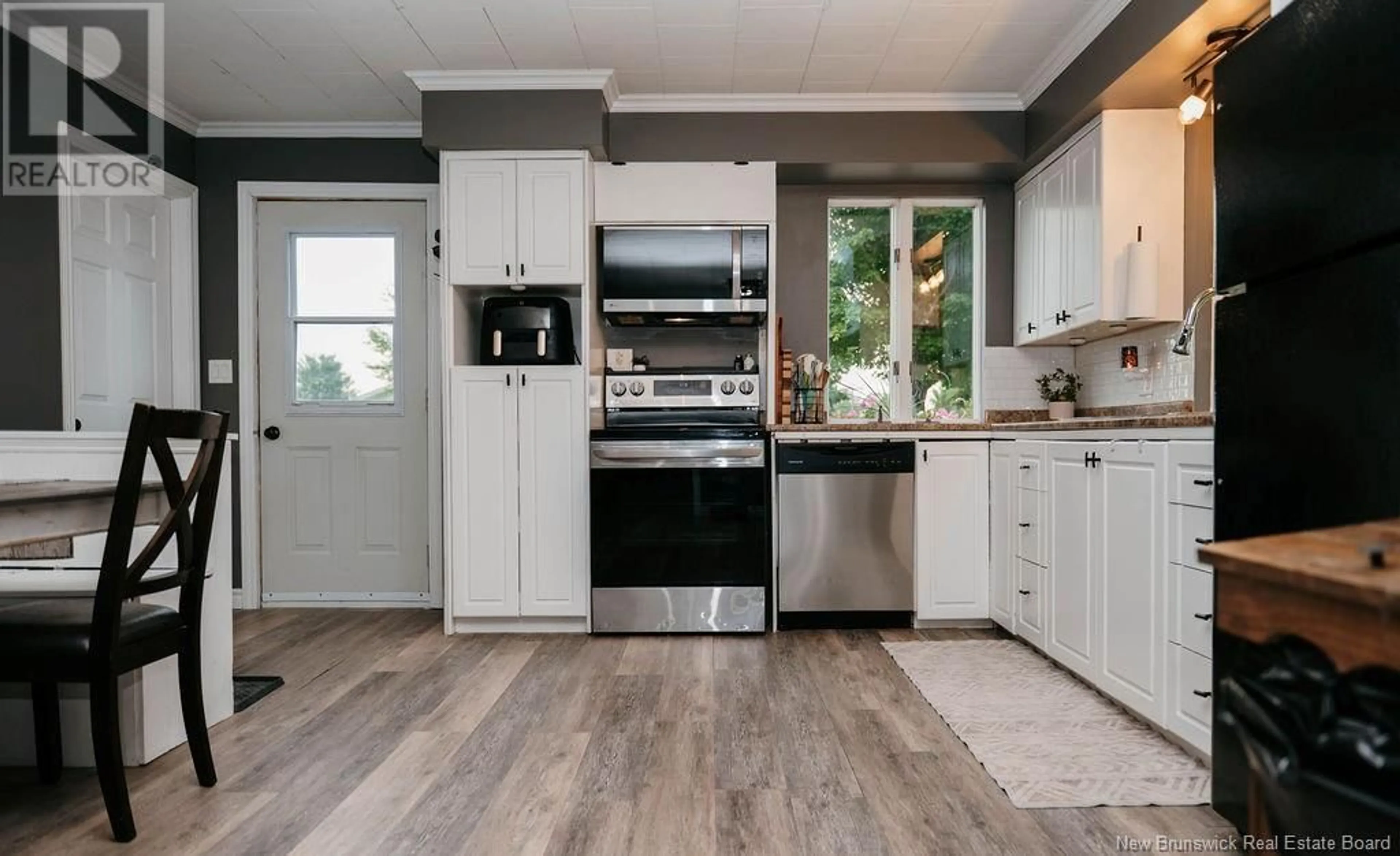 Open concept kitchen, wood/laminate floor for 2120 560 ROUTE, Lakeville New Brunswick E7K1W8