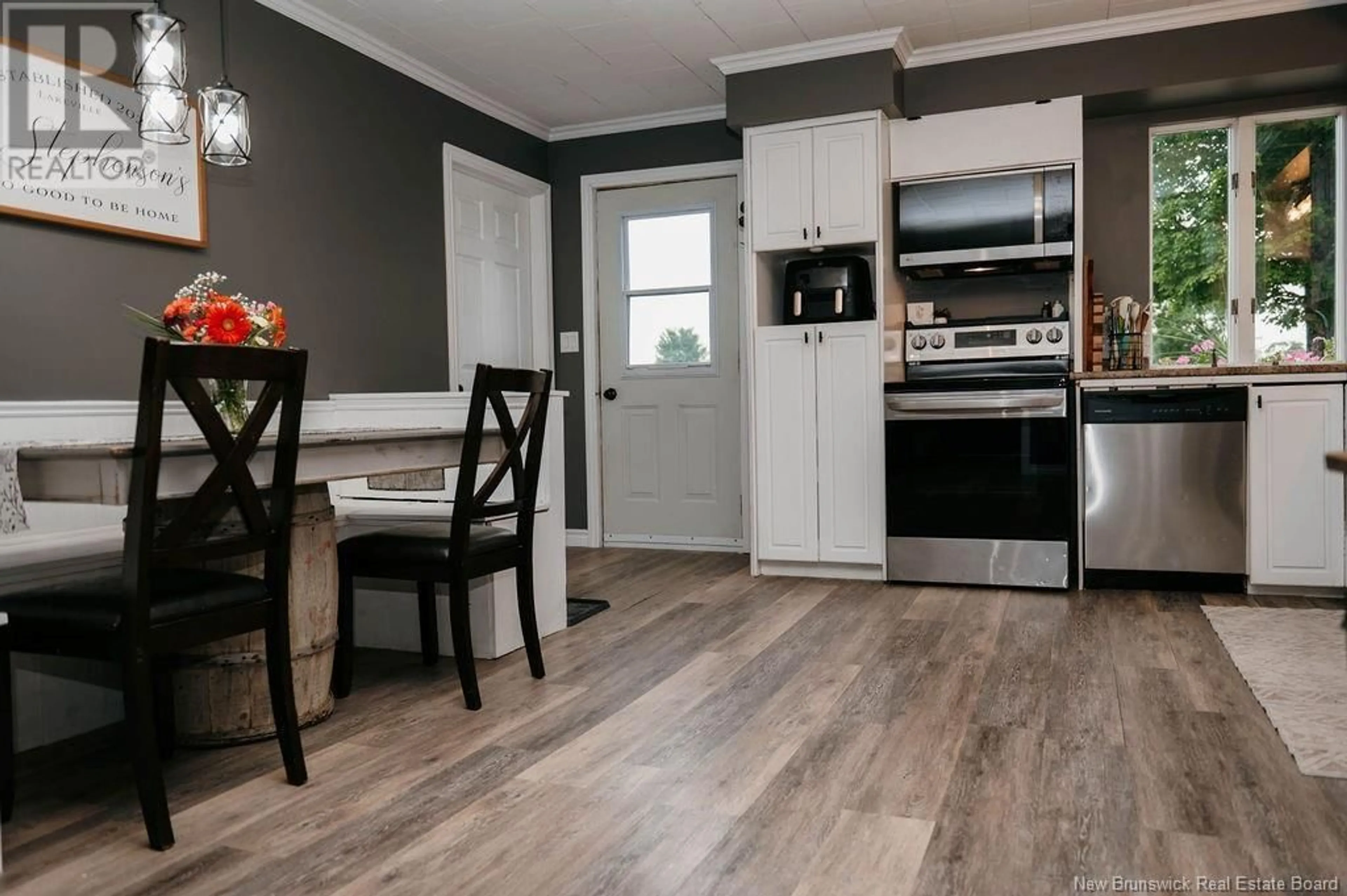 Open concept kitchen, wood/laminate floor for 2120 560 ROUTE, Lakeville New Brunswick E7K1W8