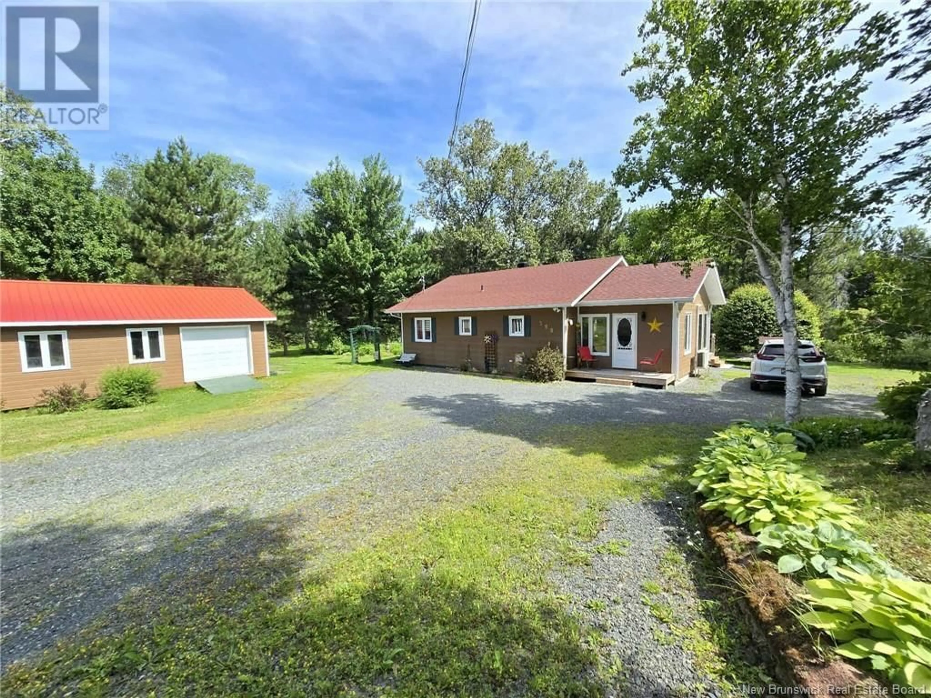A pic from outside/outdoor area/front of a property/back of a property/a pic from drone, street for 398 LINDA STREET, Beresford New Brunswick E8K2C9