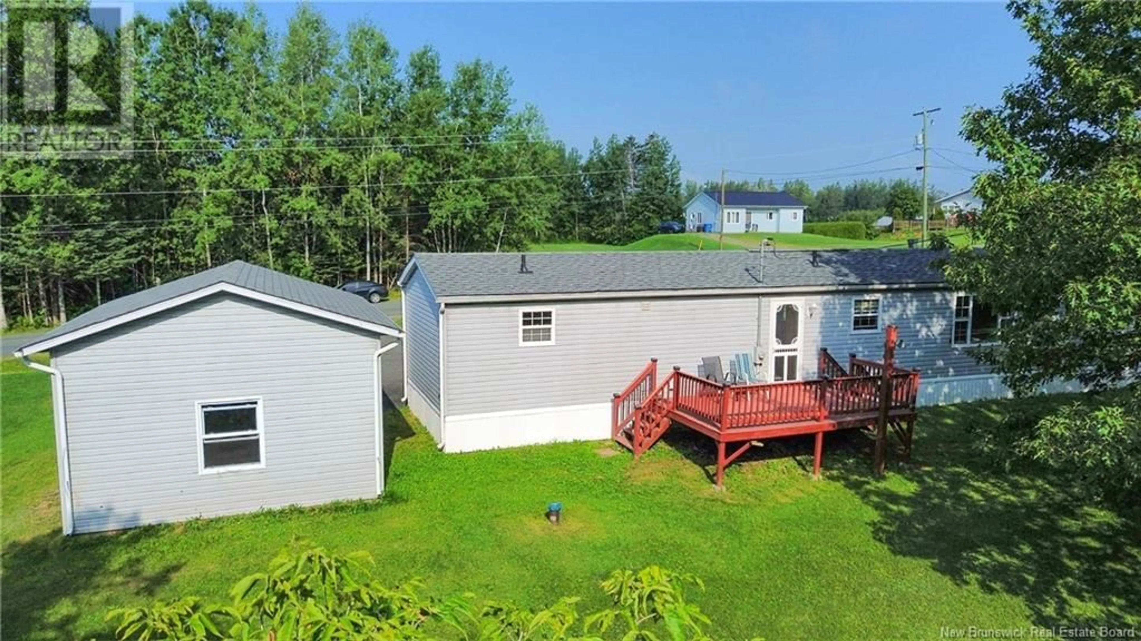 A pic from outside/outdoor area/front of a property/back of a property/a pic from drone, water/lake/river/ocean view for 18 CAHILL ROAD, Beechwood New Brunswick E7J1Z6