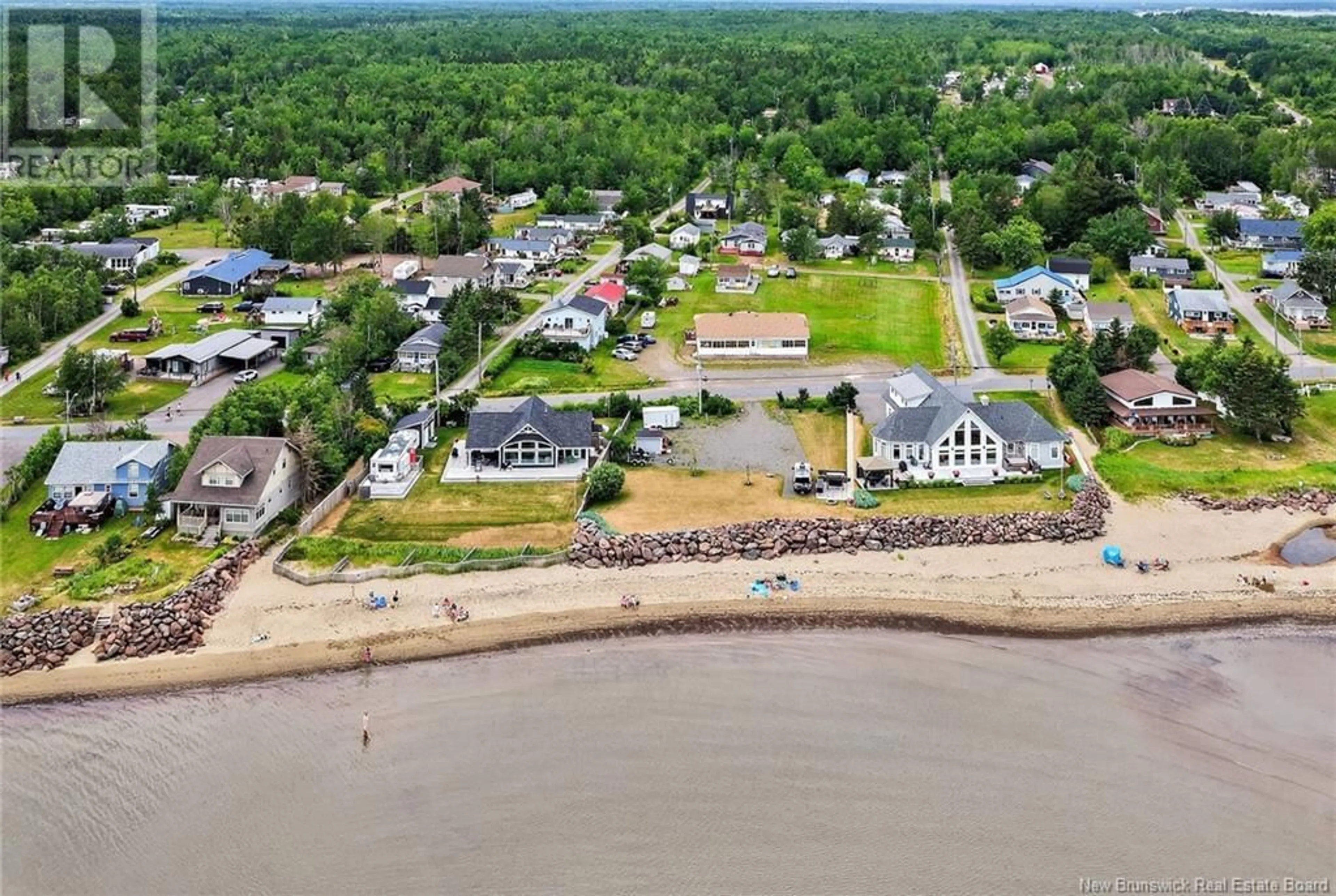 A pic from outside/outdoor area/front of a property/back of a property/a pic from drone, water/lake/river/ocean view for 3 LORRAINE AVENUE, Grande-Digue New Brunswick E4R4S1
