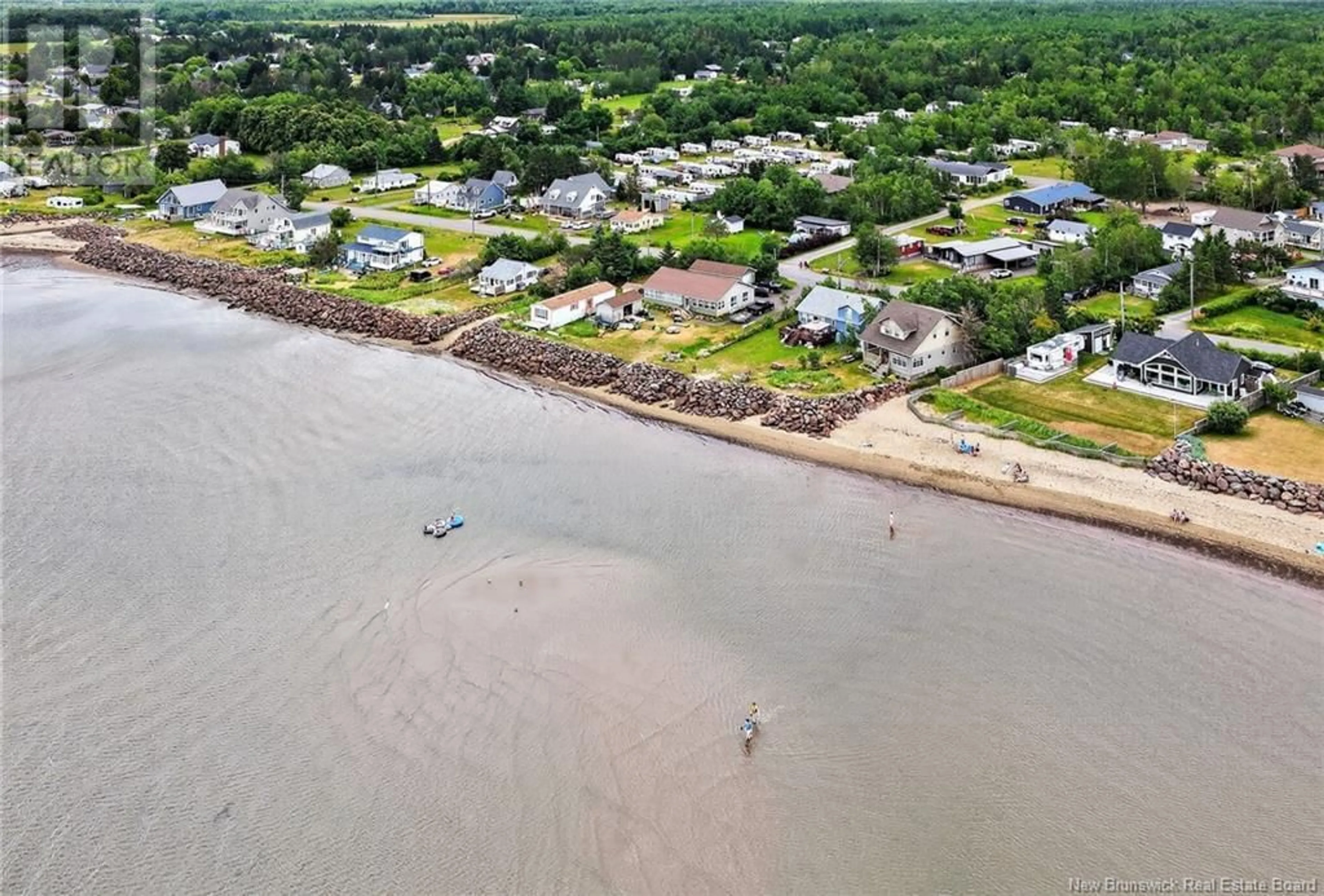 A pic from outside/outdoor area/front of a property/back of a property/a pic from drone, water/lake/river/ocean view for 3 LORRAINE AVENUE, Grande-Digue New Brunswick E4R4S1