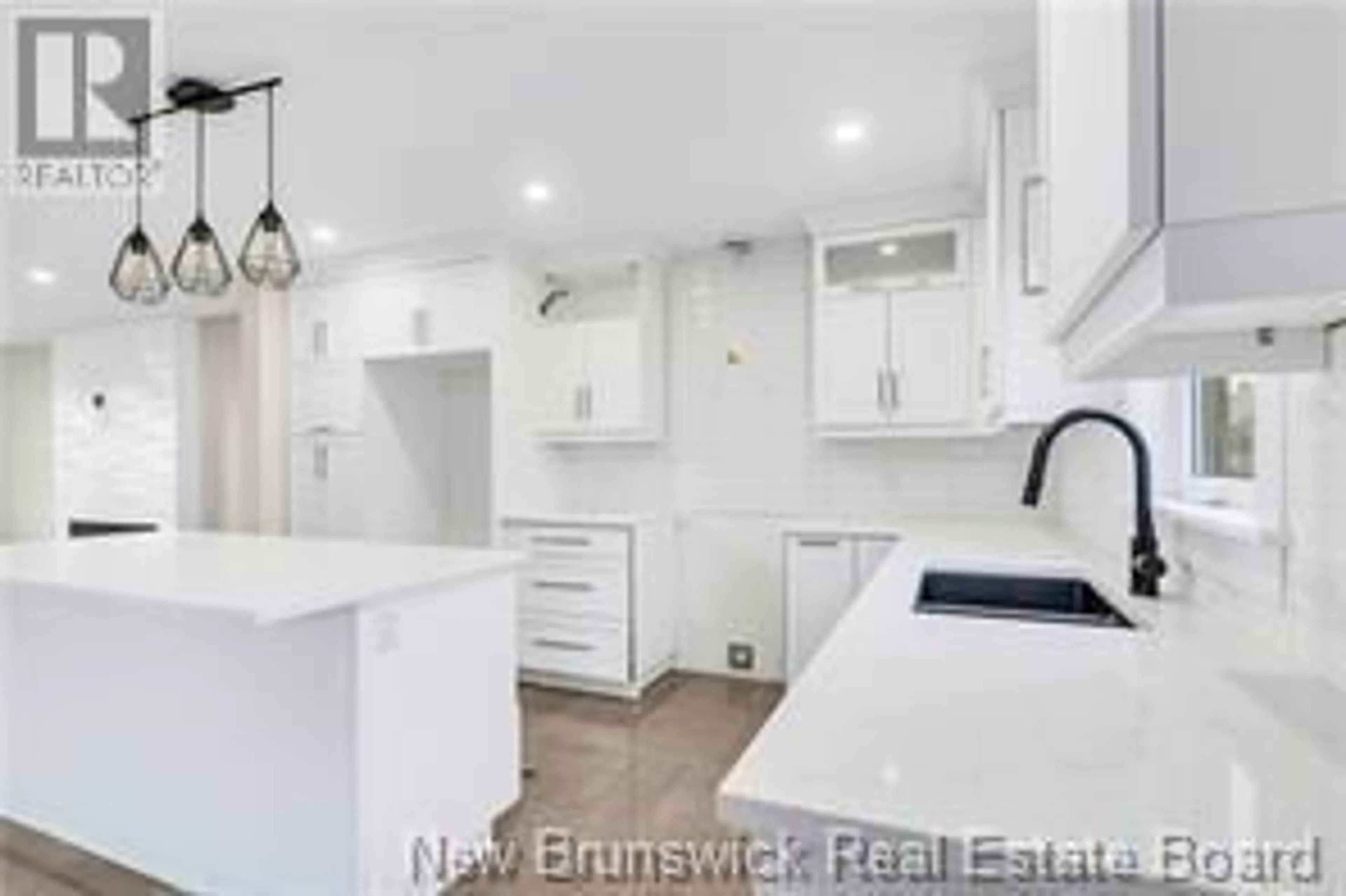 Open concept kitchen, wood/laminate floor for 179 RIPPLEWOOD ROAD, Moncton New Brunswick E1A2A7