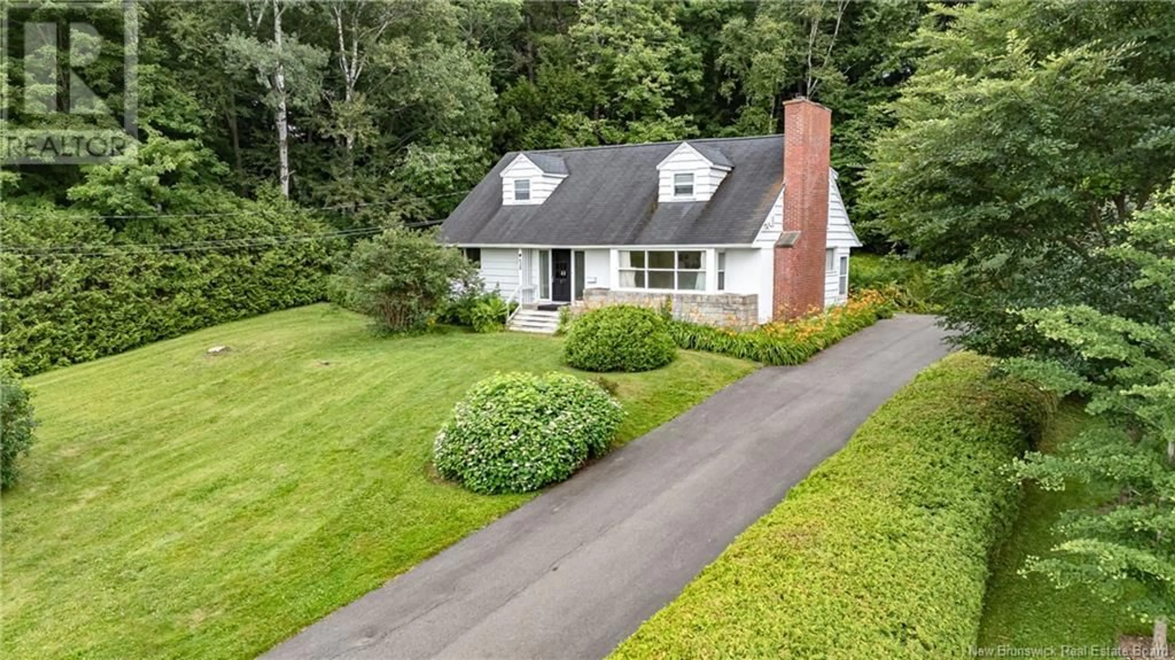 A pic from outside/outdoor area/front of a property/back of a property/a pic from drone, street for 628 GOLF CLUB ROAD, Fredericton New Brunswick E3B7S5