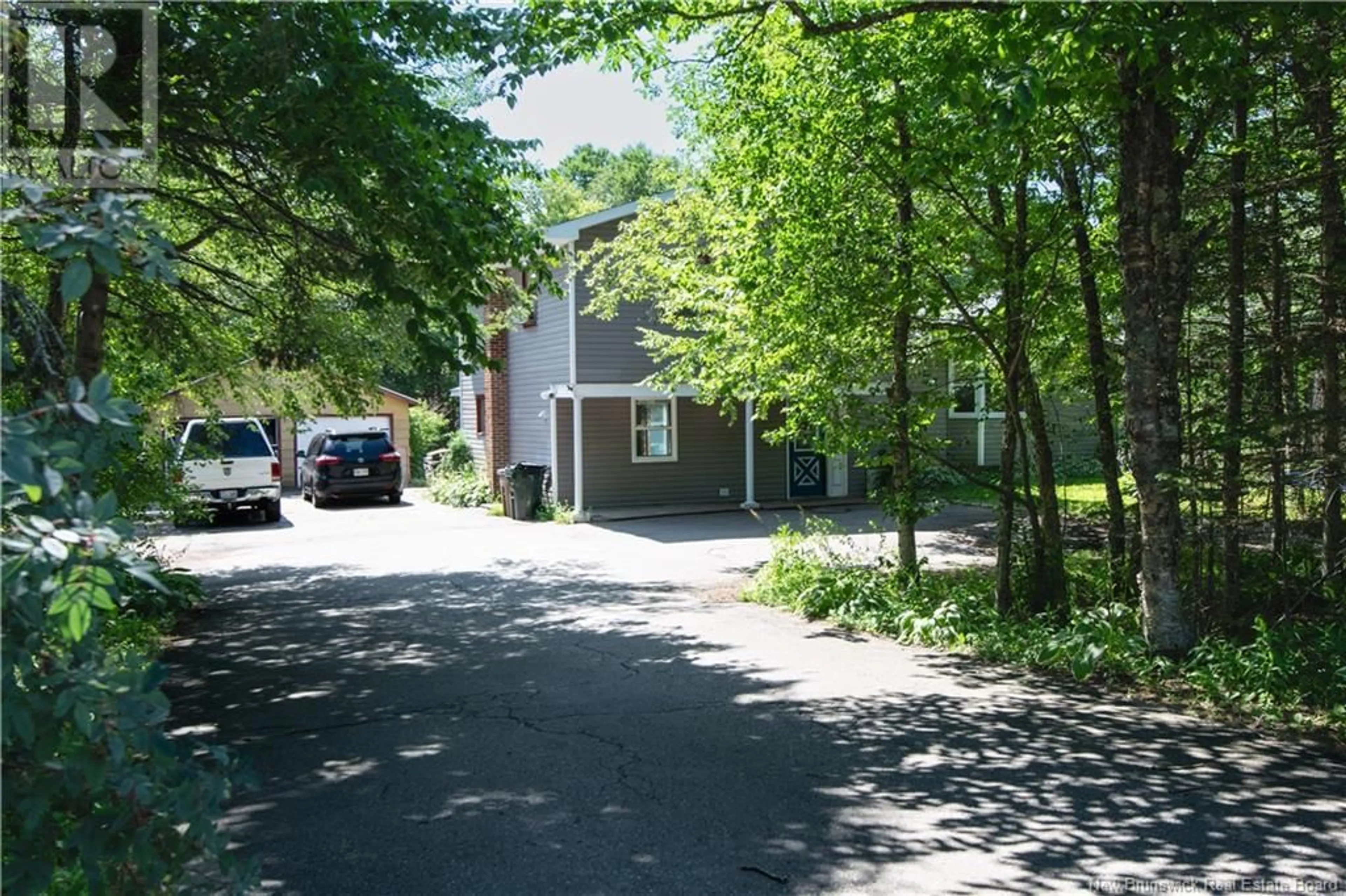 A pic from outside/outdoor area/front of a property/back of a property/a pic from drone, street for 2980 LOCH LOMOND ROAD, Saint John New Brunswick E2N1B1