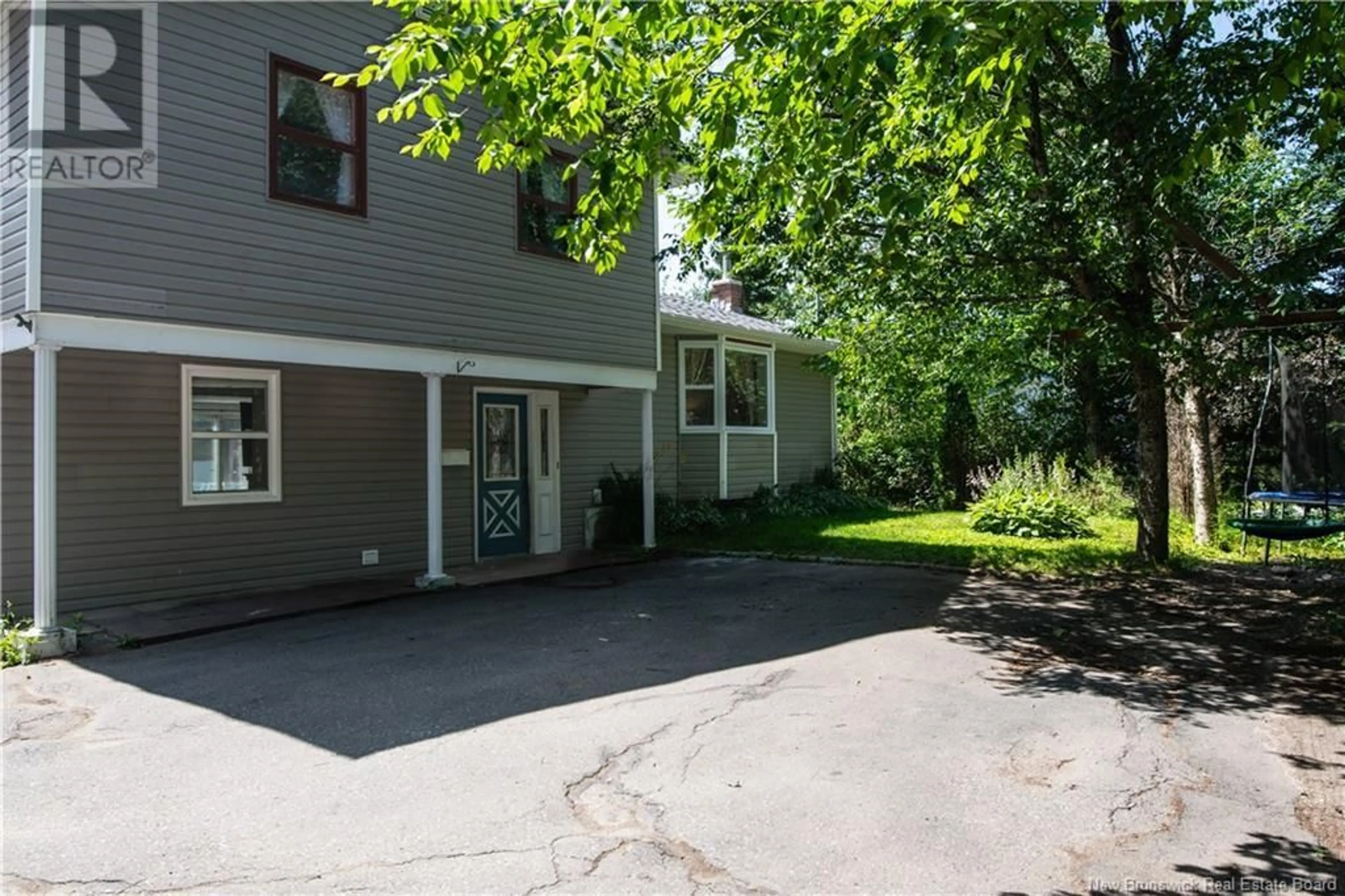 A pic from outside/outdoor area/front of a property/back of a property/a pic from drone, street for 2980 LOCH LOMOND ROAD, Saint John New Brunswick E2N1B1