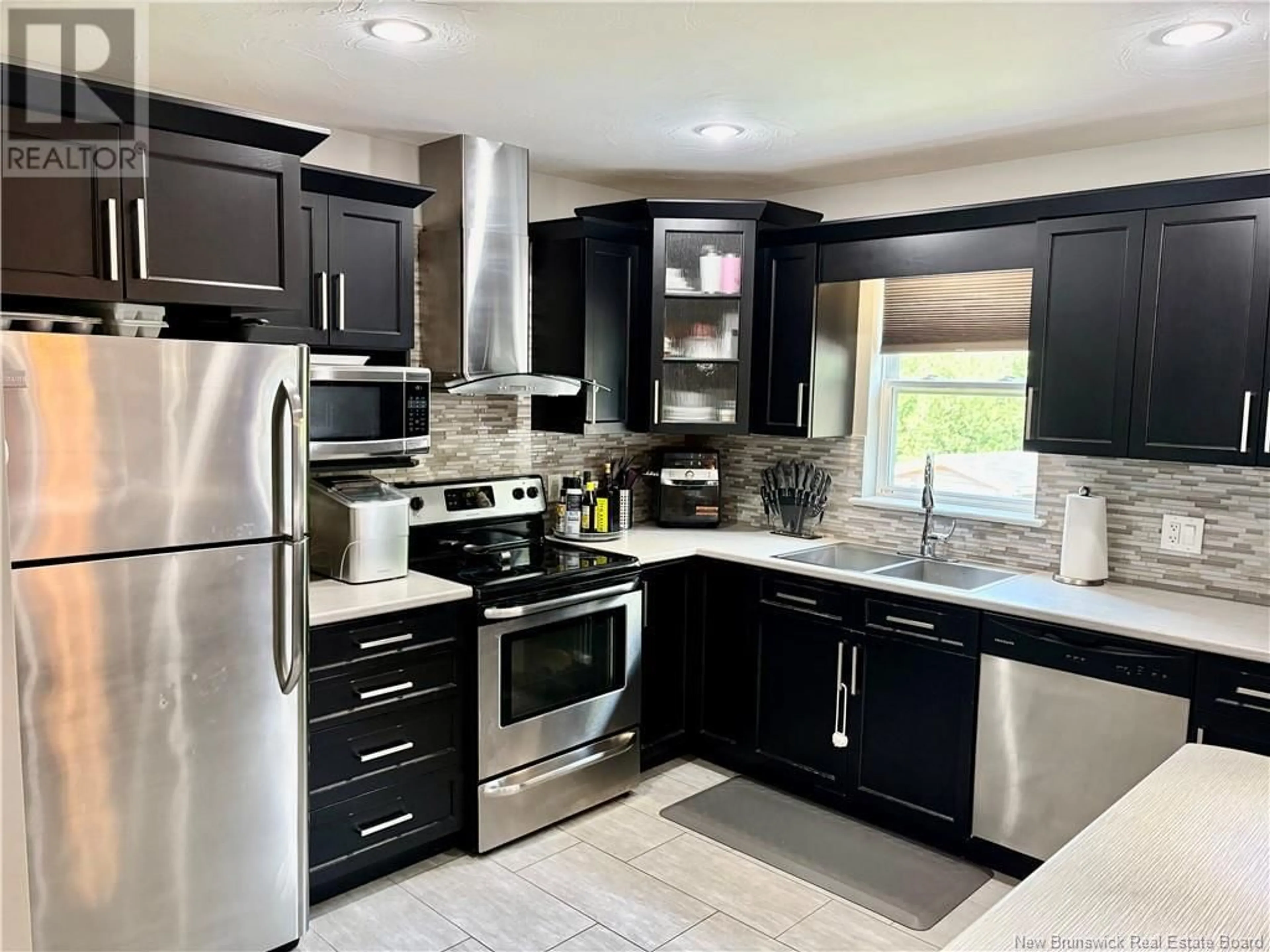 Contemporary kitchen, ceramic/tile floor for 216 BELLE FORET, Dieppe New Brunswick E1A9E5