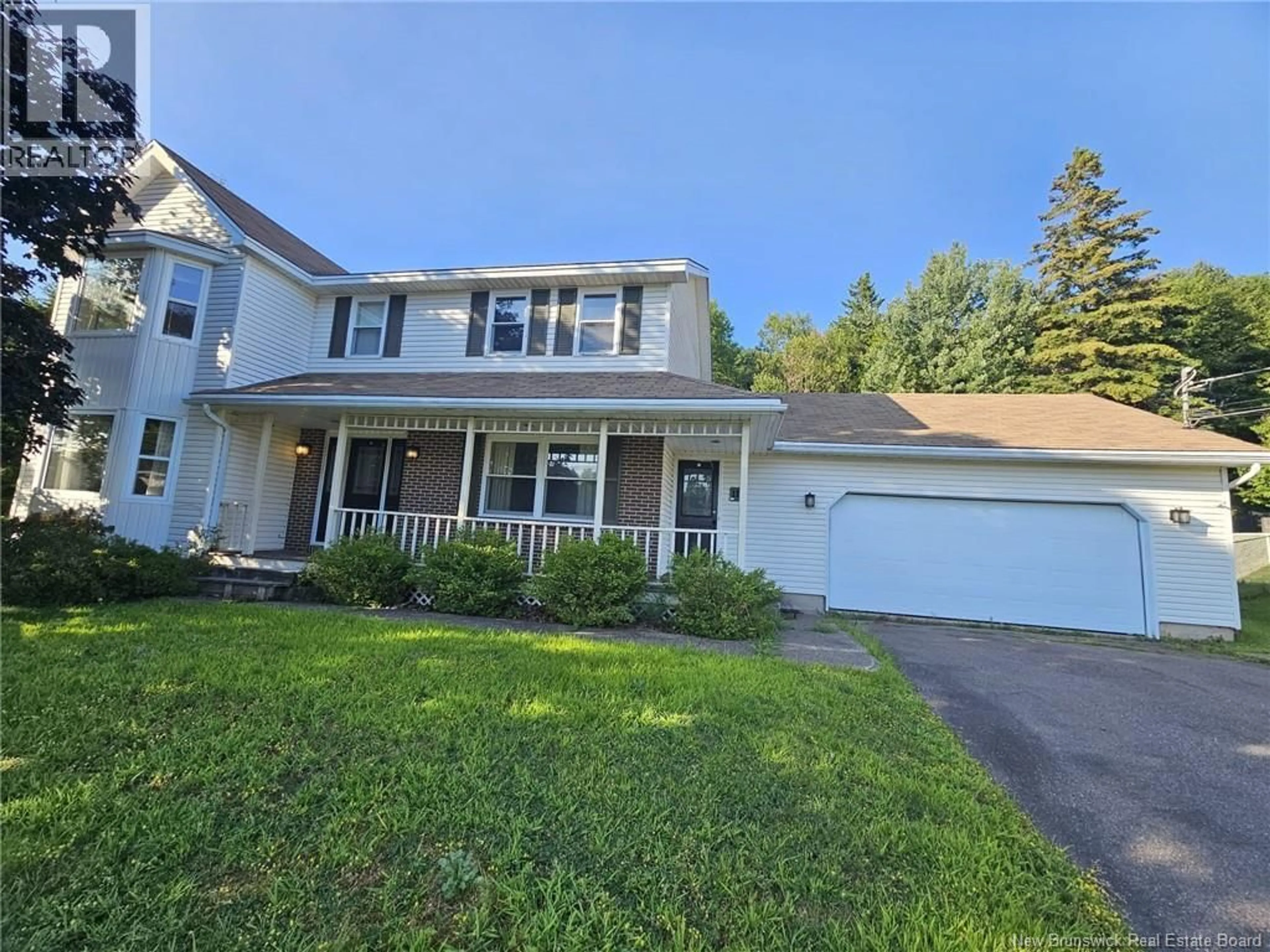 Home with vinyl exterior material, street for 11 COVE CRESCENT, Rothesay New Brunswick E2E4Y5