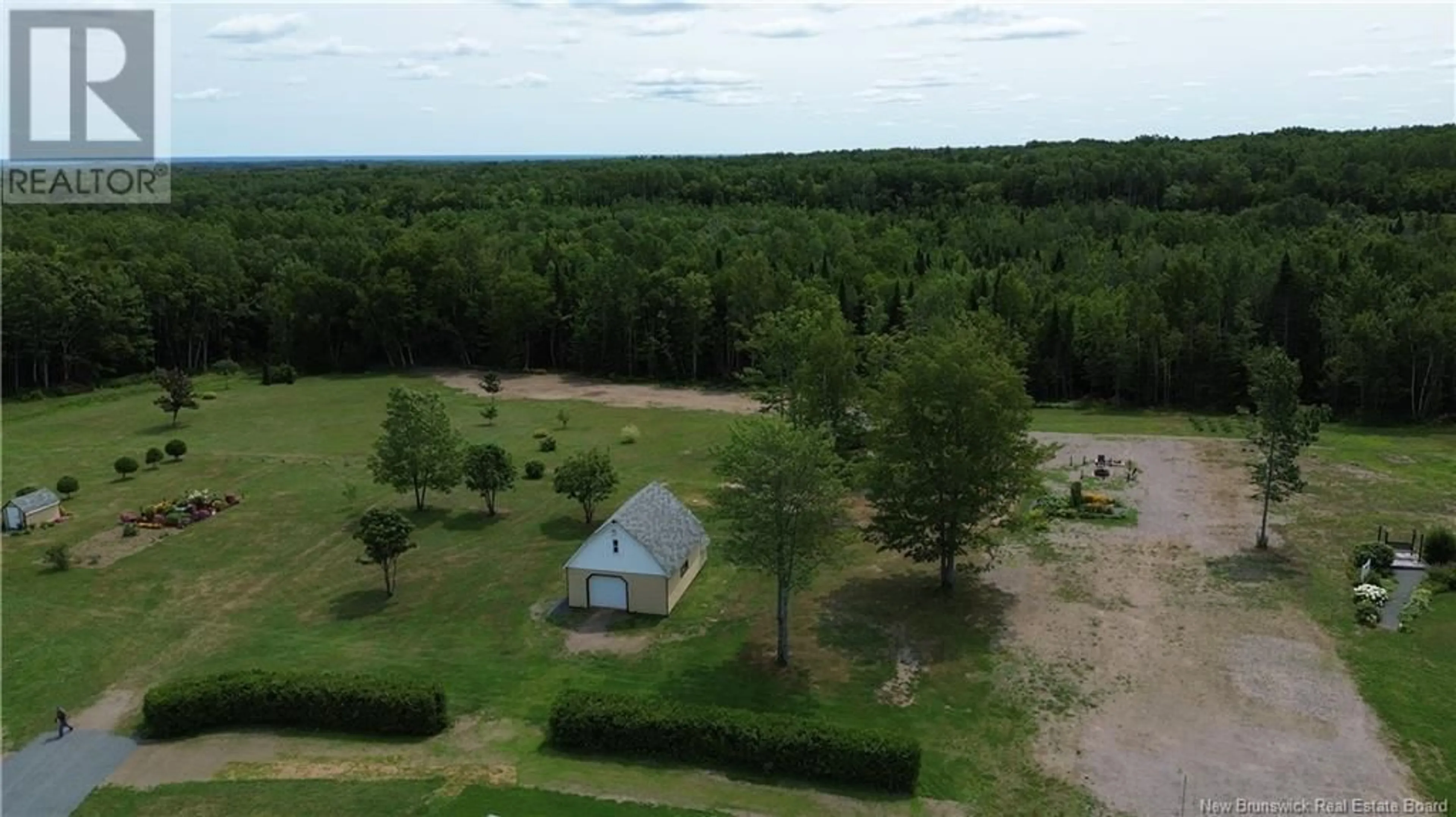 A pic from outside/outdoor area/front of a property/back of a property/a pic from drone, water/lake/river/ocean view for 2269 CHEMIN SORMANY, Sormany New Brunswick E8K3A9