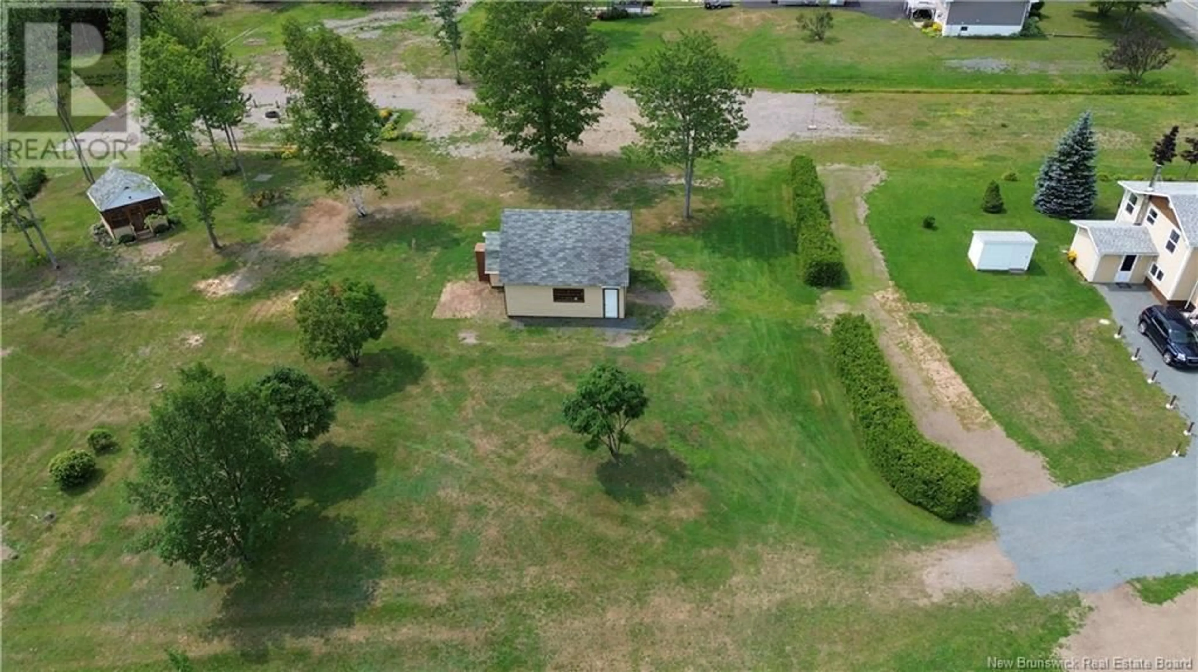 A pic from outside/outdoor area/front of a property/back of a property/a pic from drone, unknown for 2269 CHEMIN SORMANY, Sormany New Brunswick E8K3A9