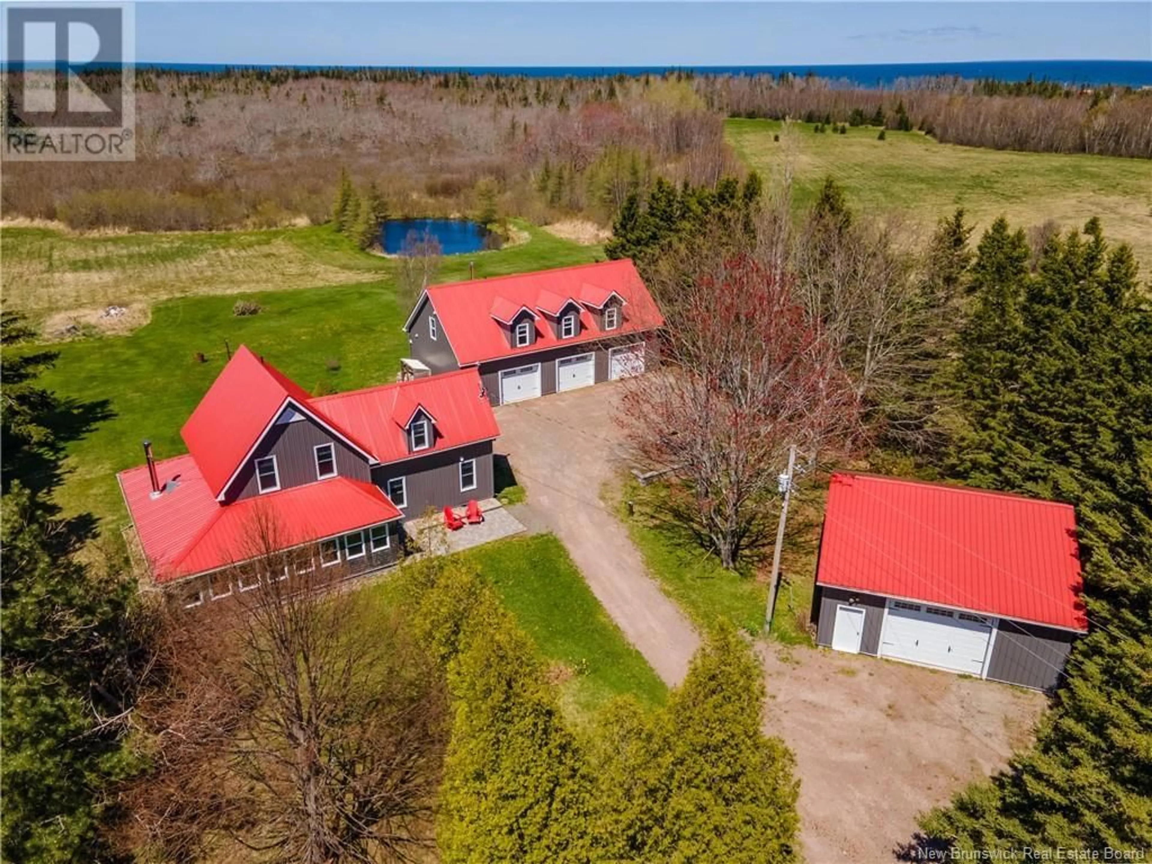 A pic from outside/outdoor area/front of a property/back of a property/a pic from drone, water/lake/river/ocean view for 2069 ROUTE 955, Little Shemogue New Brunswick E4M3K2