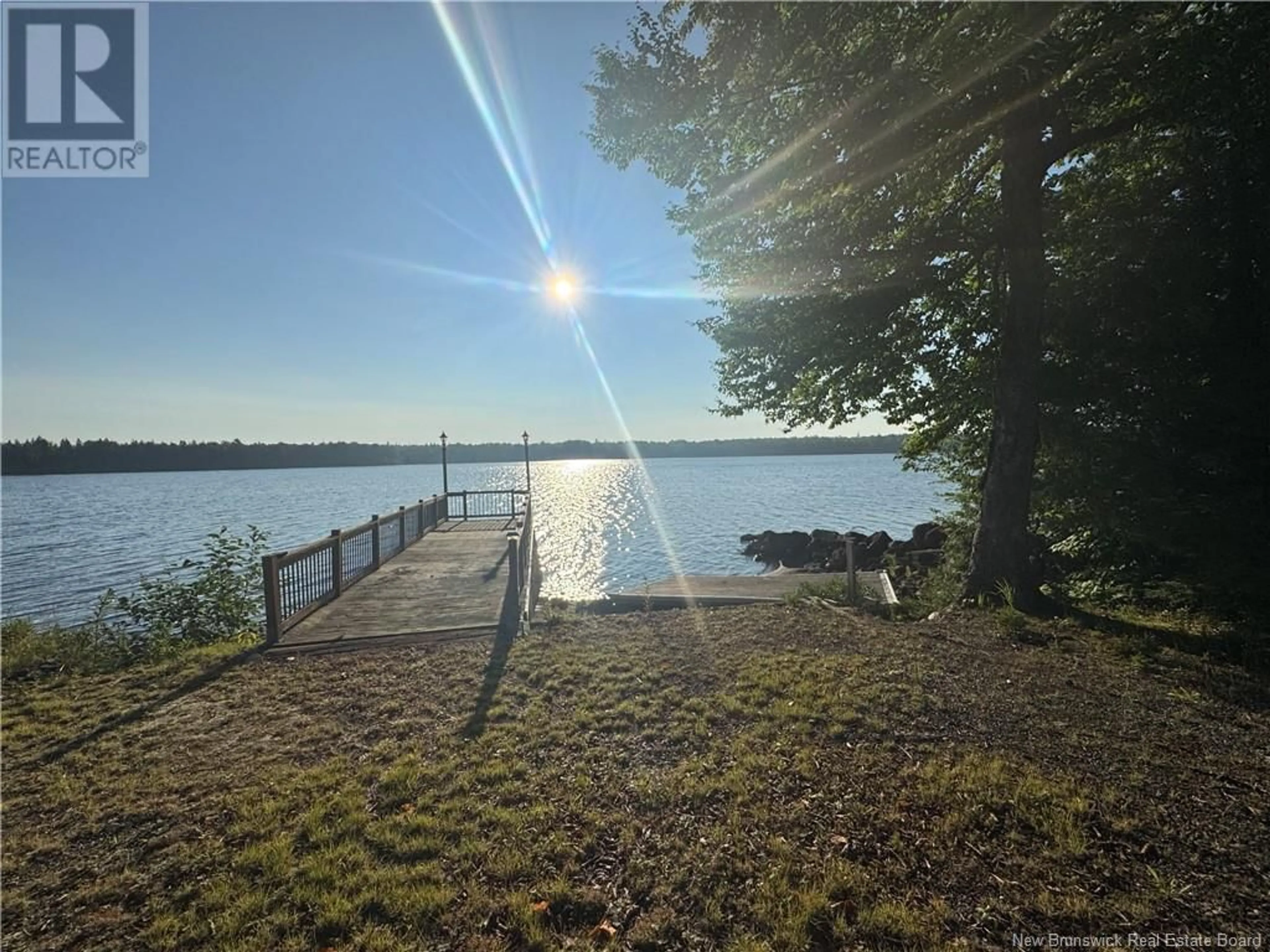A pic from outside/outdoor area/front of a property/back of a property/a pic from drone, water/lake/river/ocean view for 30 DEER POINT ROAD, Johnson Settlement New Brunswick E5A1S5