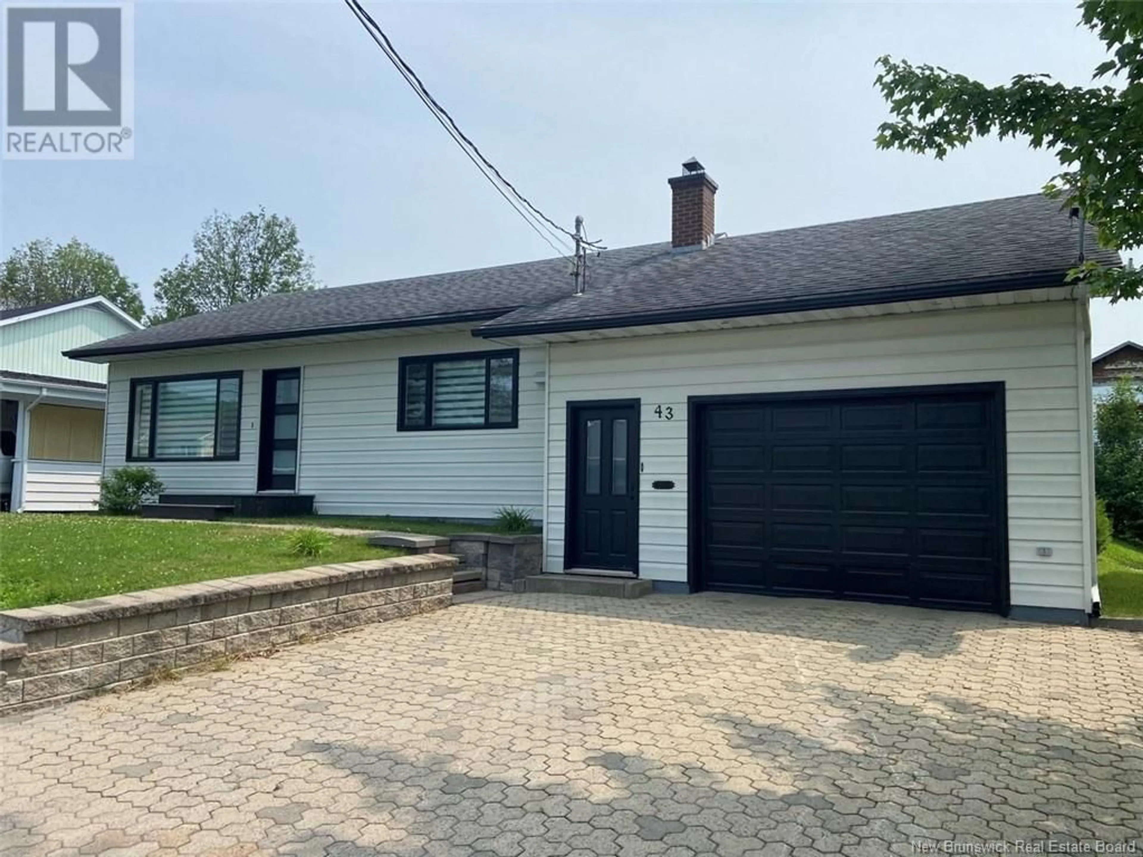 A pic from outside/outdoor area/front of a property/back of a property/a pic from drone, street for 43 47TH AVENUE, Edmundston New Brunswick E3V3C1